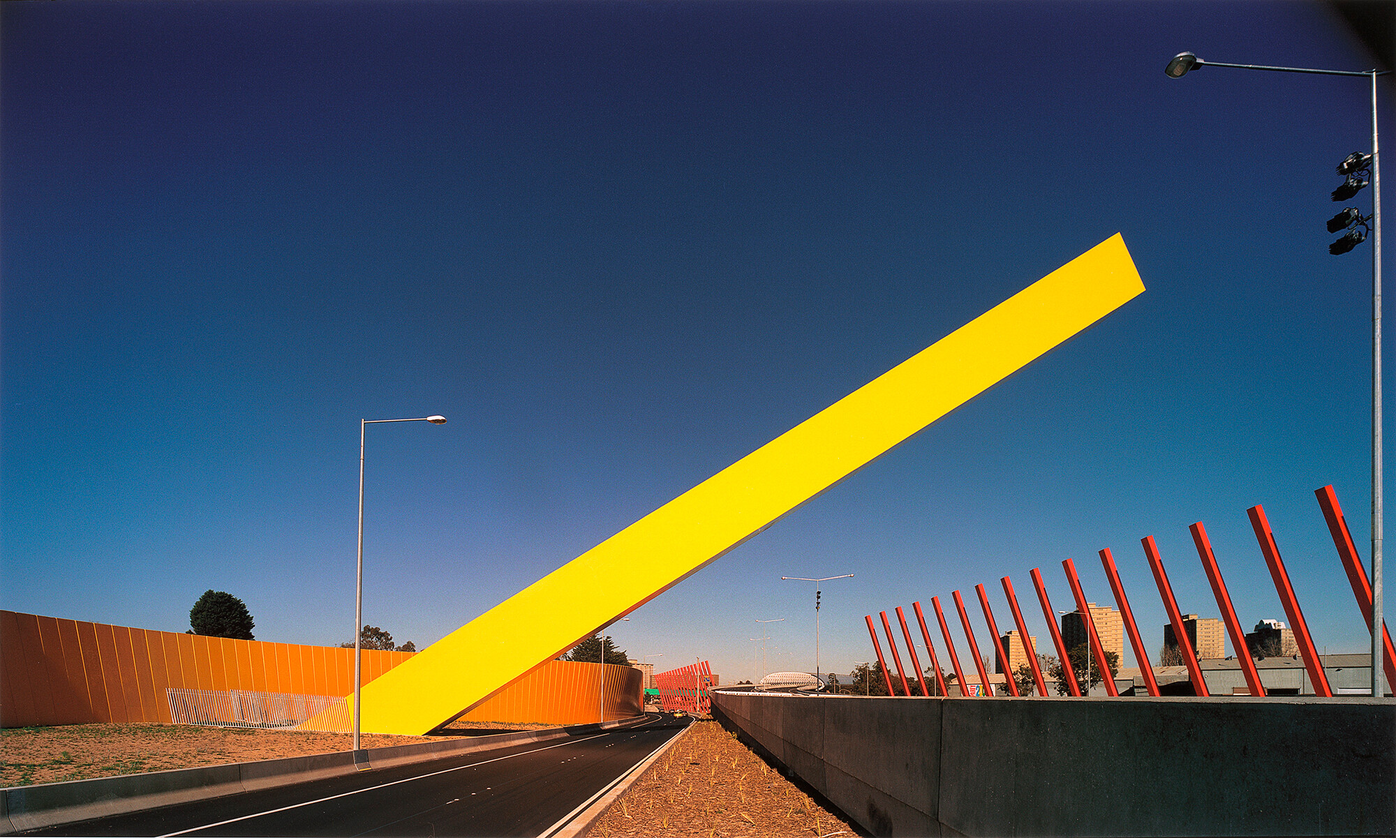 <p>John Gollings, <em>Tullamarine Freeway entry statement – Denton Corker Marshall </em>1998, inkjet print, 84.0 x 110.7 cm, National Gallery of Victoria, Melbourne. Purchased, Victorian Foundation for Living Australian Artists, 2017. 2017.418 © John Gollings. Photograph courtesy of National Gallery of Victoria.</p>