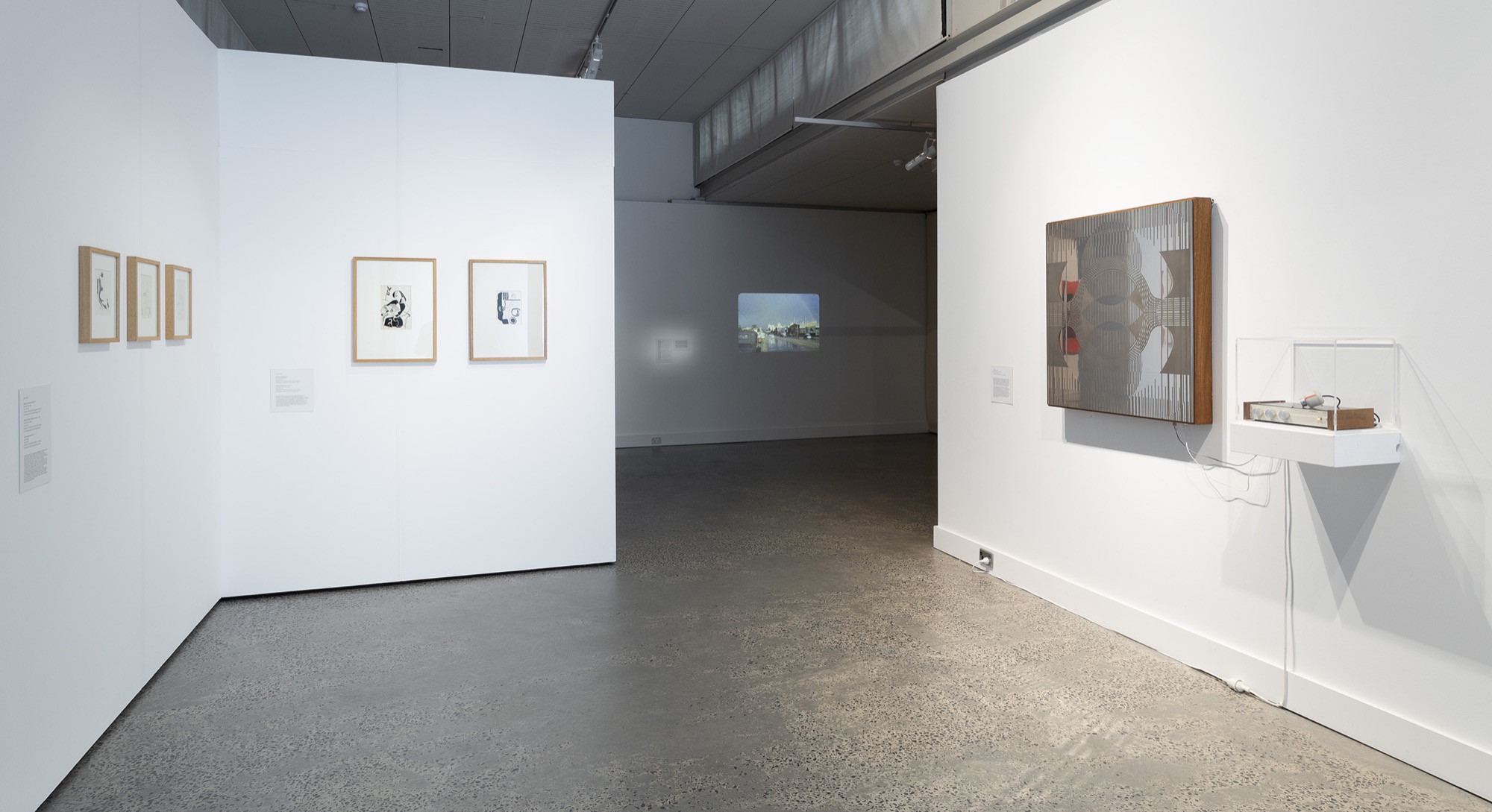 <em>Solid Light: Josef</em> <em>Stanislaw Ostoja-Kotkowski</em>, installation view, McClelland Sculpture Park+Gallery, Langwarrin, 2019. On the right is <em>Theremin 72</em>, 1972, electronic device, wood, metal, 91.5 x 91.5 x 11.0 cm, collection of McClelland Sculpture Park+Gallery. Photo: Christian Capurro.