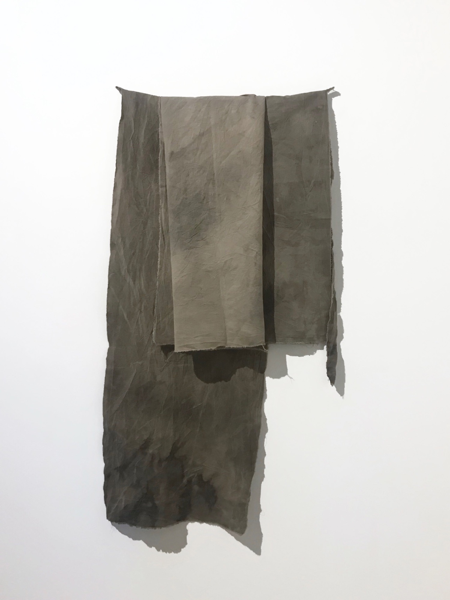 Katie West, <em>keeping pieces, yirarlla</em>, 2018, calico dyed with eucalyptus and puff ball, dimensions variable.