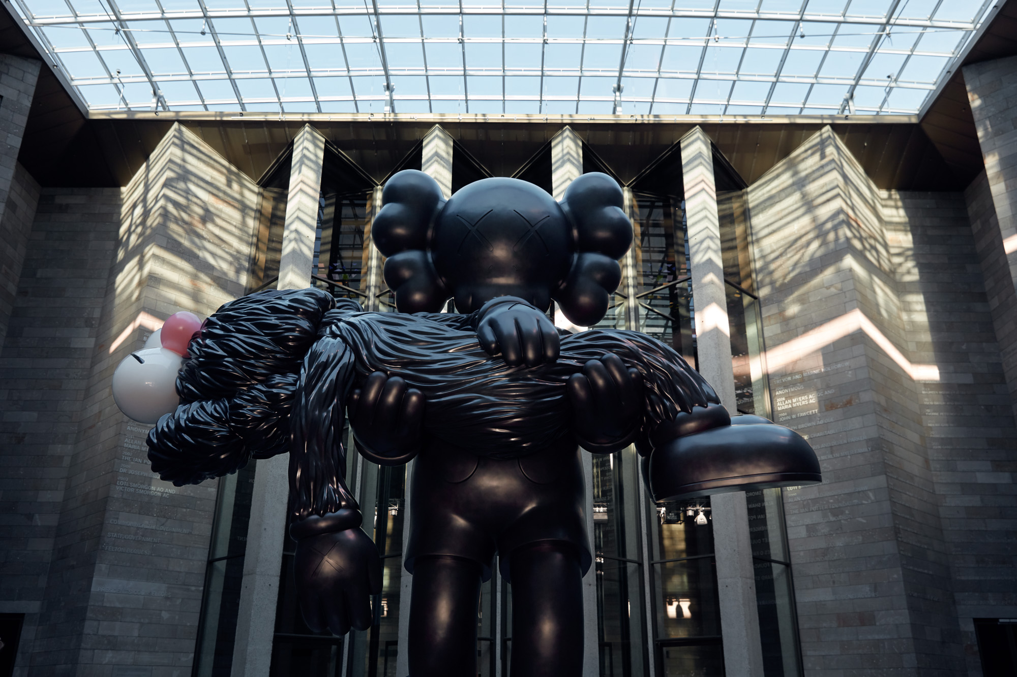 Installation view of KAWS’s <em>GONE</em>, 2019 on display for KAWS: Companionship in the Age of Loneliness at NGV International, Melbourne 20 September 2019 – 13 April 2020. Photo © Tom Ross