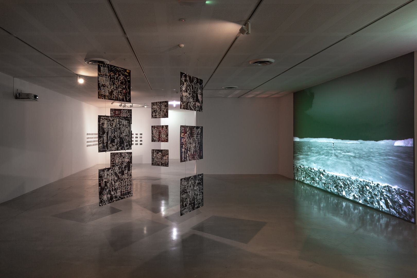 Khaled Sabsabi, 40, 2020. 2 channel UHD video installation with audio, acrylic paint, enamel paint and oil stick on acrylic glass, acrylic paint, enamel paint and oil stick on paper. 17:45 mins. Campbelltown Arts Centre, 2022. Credit: Document Photography