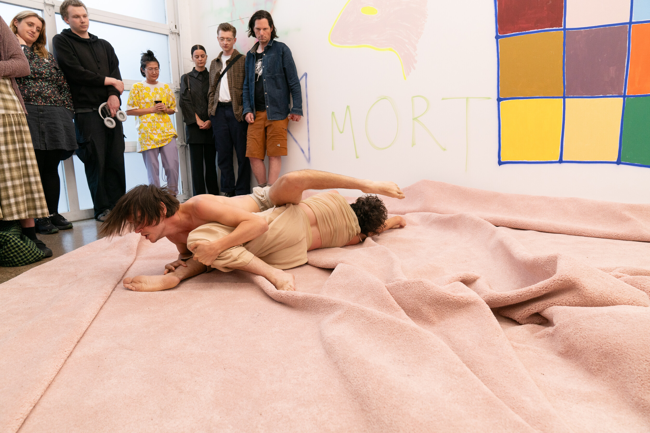 Phillip Adams, Triptych, performed by Ben Hurley and Oliver Savariego, 2024, performance documentation at the opening event of Mikala Dwyer and Paul Yore, LA SALLE DES TAUREAUX, Gertrude Glasshouse, Naarm Melbourne. Photo: Machiko Abe. Courtesy of the artists and Gertrude.