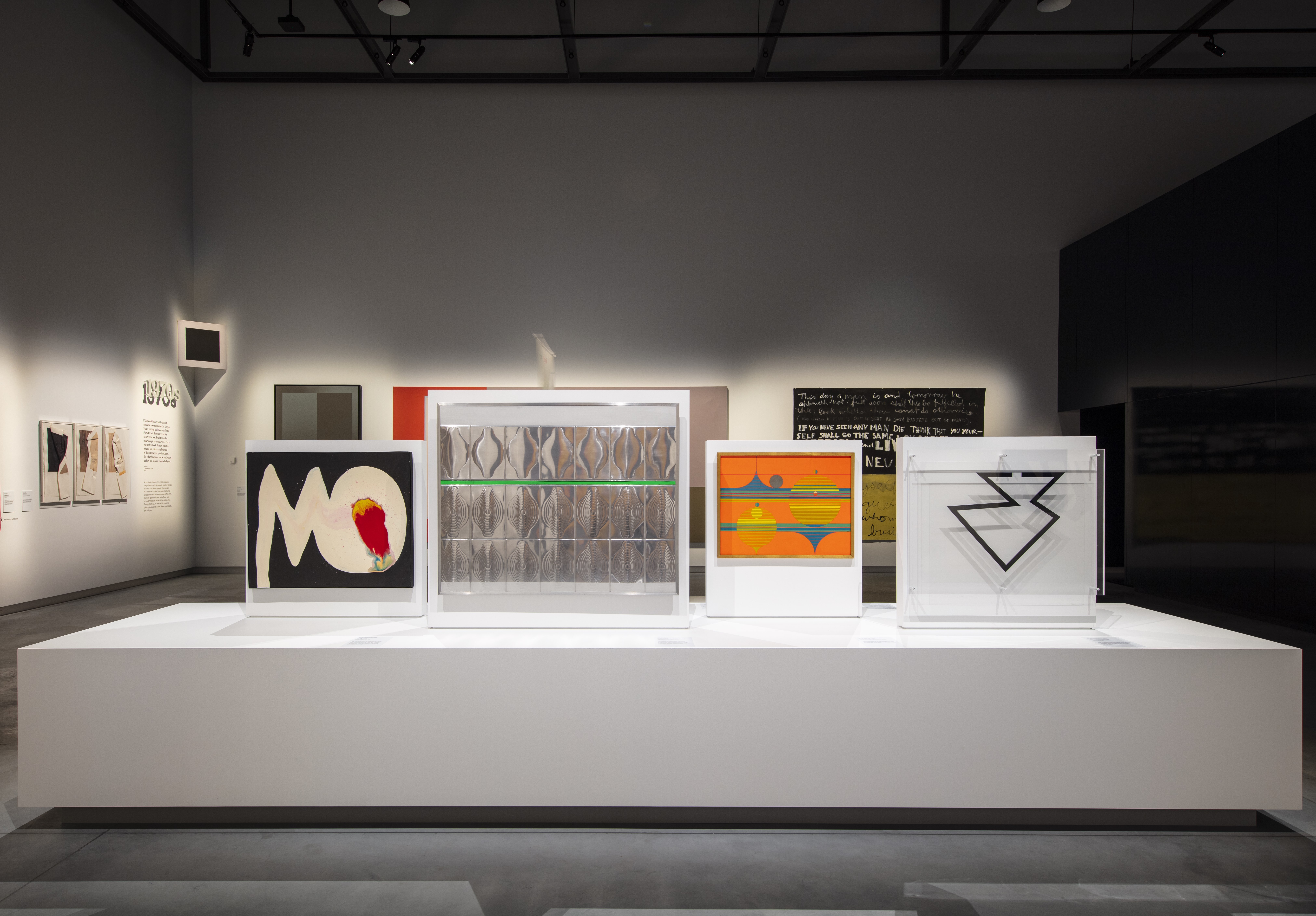 Sadamasa Motonaga, <em>Work</em>, 1964, PW1969.15, © Estate of Sadamasa Motonaga; Getulio Alviani, <em>Superficie a testura vibratile (opera programmata N. 3142) (Surface with vibrating texture, programmed work no. 3142)</em> 1963, PW1968.2, © Getulio Alviani/SIAE. Copyright Agency, 2021; Stanislaus Ostoja-Kotkowski, <em>Two horizons</em>, 1966, UA2012.205 © Estate of Stanislaus Ostoja-Kotkowski; Lucio Fontana, <em>Concetto spaziale (Spatial concept)</em>, 1968, PW1968.16, © Lucio Fontana/SIAE. Copyright Agency, 2021.