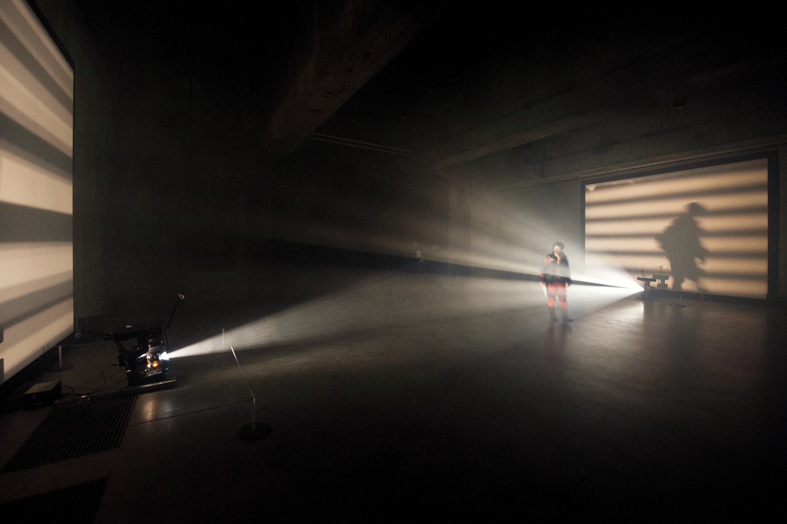 Lis Rhodes, <em>Light Music</em>, 1975, film, 16 mm, 2 projections, black and white,<br />
sound (stereo) and smoke machine, duration: 25min. © Lis Rhodes. Photo/ Tate.