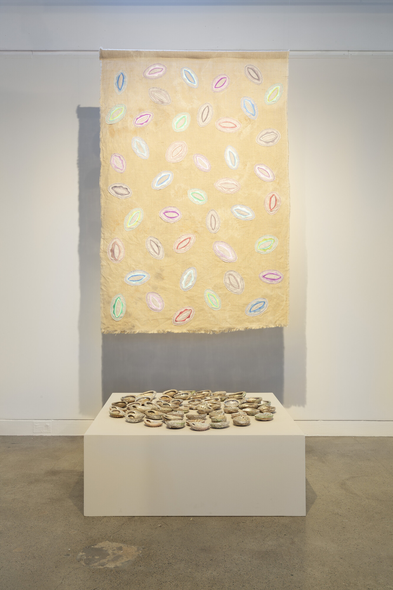 Kirli Saunders, <em>Greedy</em>, 2023. Single-channel audio, spoken poem and tapestry. Commissioned by Cement Fondu. Linger, Dash, Talk installation view at Cement Fondu. 2023. Photograph: Jessica Maurer.