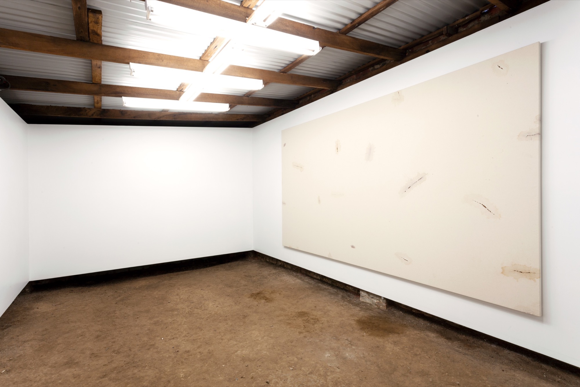 Luke Sands, <em>Untitled</em>, 2019, chewed canvas, 313 cm x 184 cm. Installation view: Guzzler, Melbourne. Photograph: the artist, courtesy the artist.