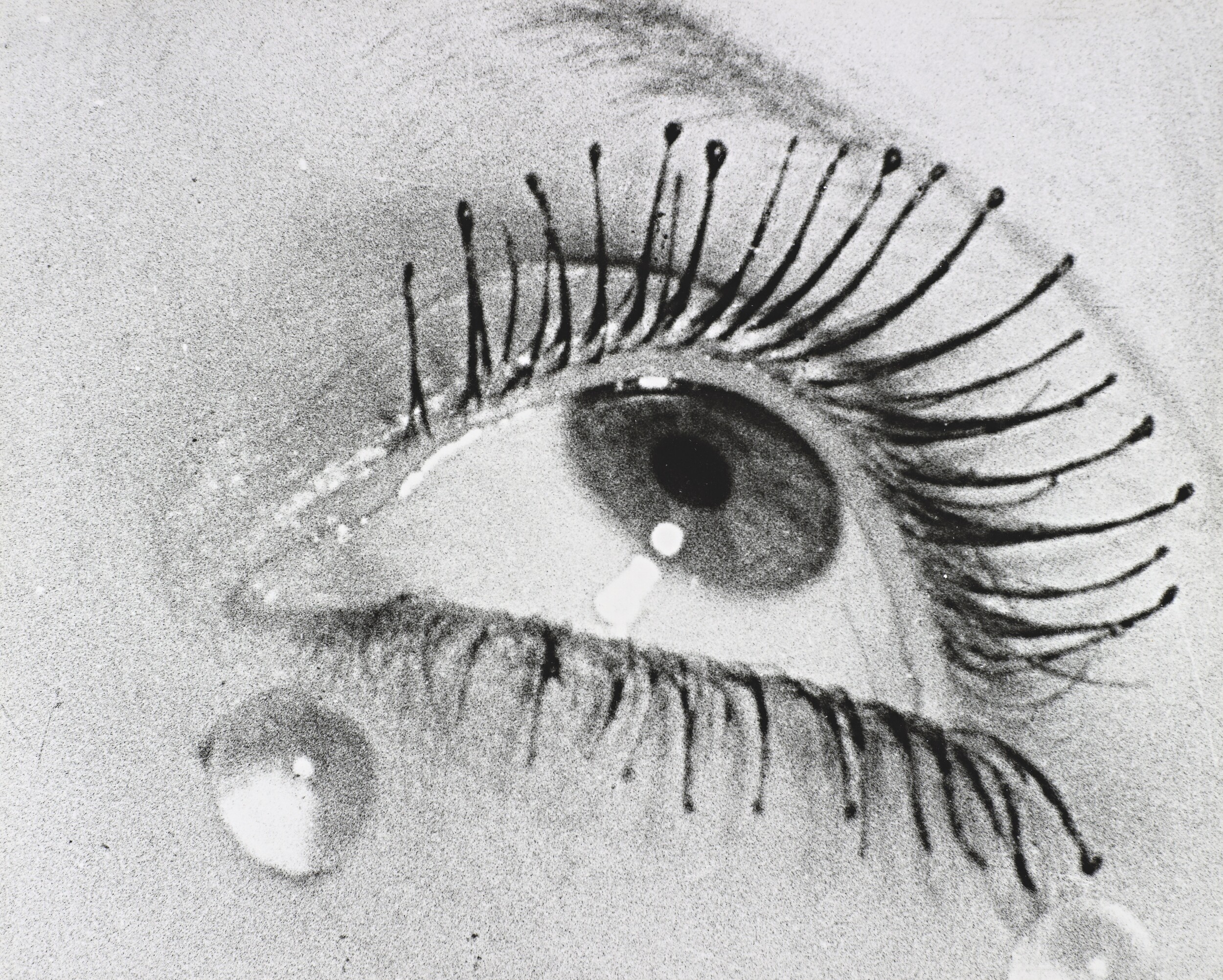<p>Man Ray,<em> Eye and Tears,</em> 1932, printed 1972, gelatin silver photograph, 20.6 x 24.7 cm (image), 20.6 x 25.5 cm (sheet). National Gallery of Victoria, Melbourne, purchased 1973</p>