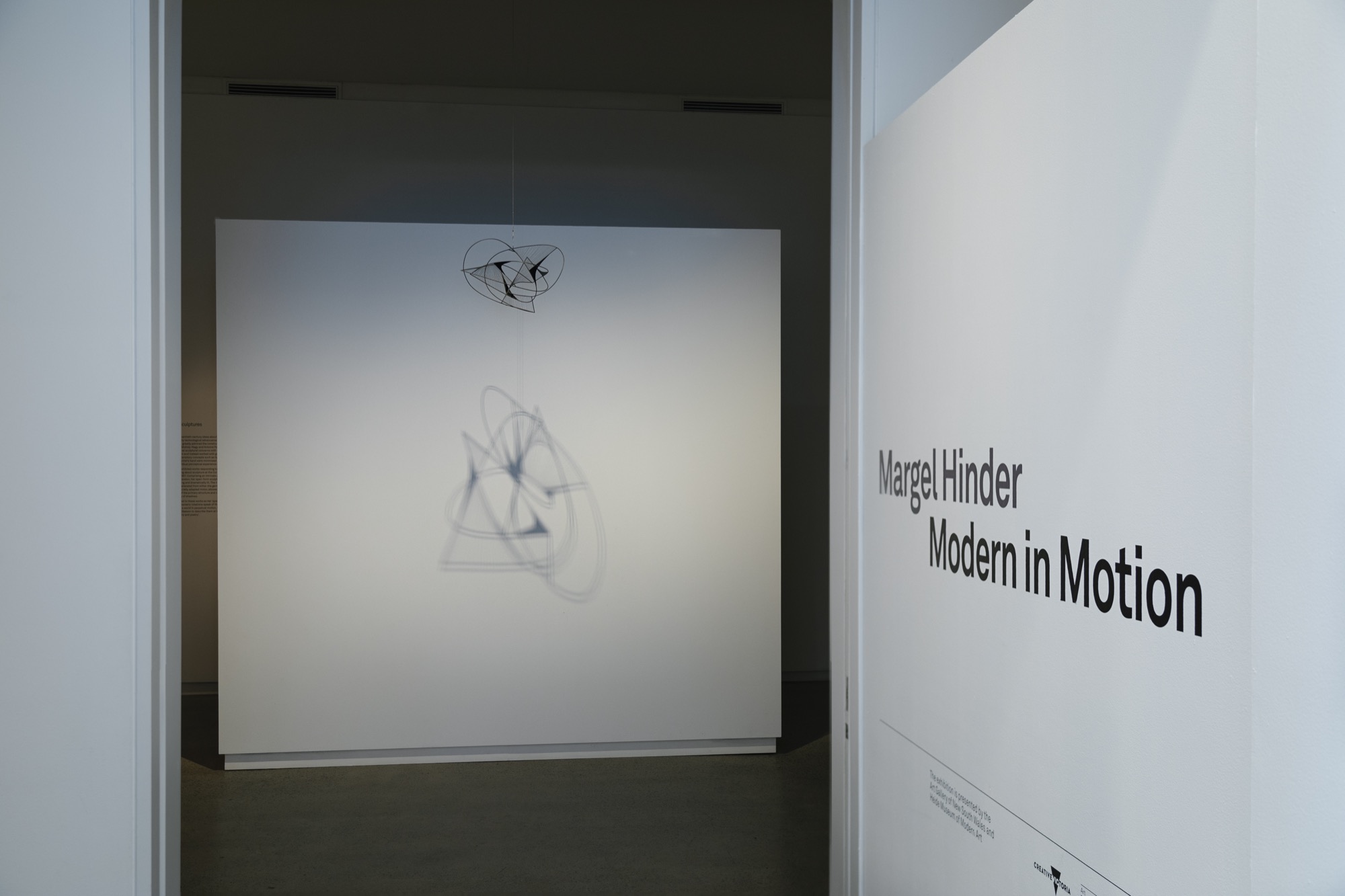 Installation view, Margel Hinder: Modern in Motion, Heide Museum of Modern Art, entrance view with <em>Revolving Construction</em> (1957).