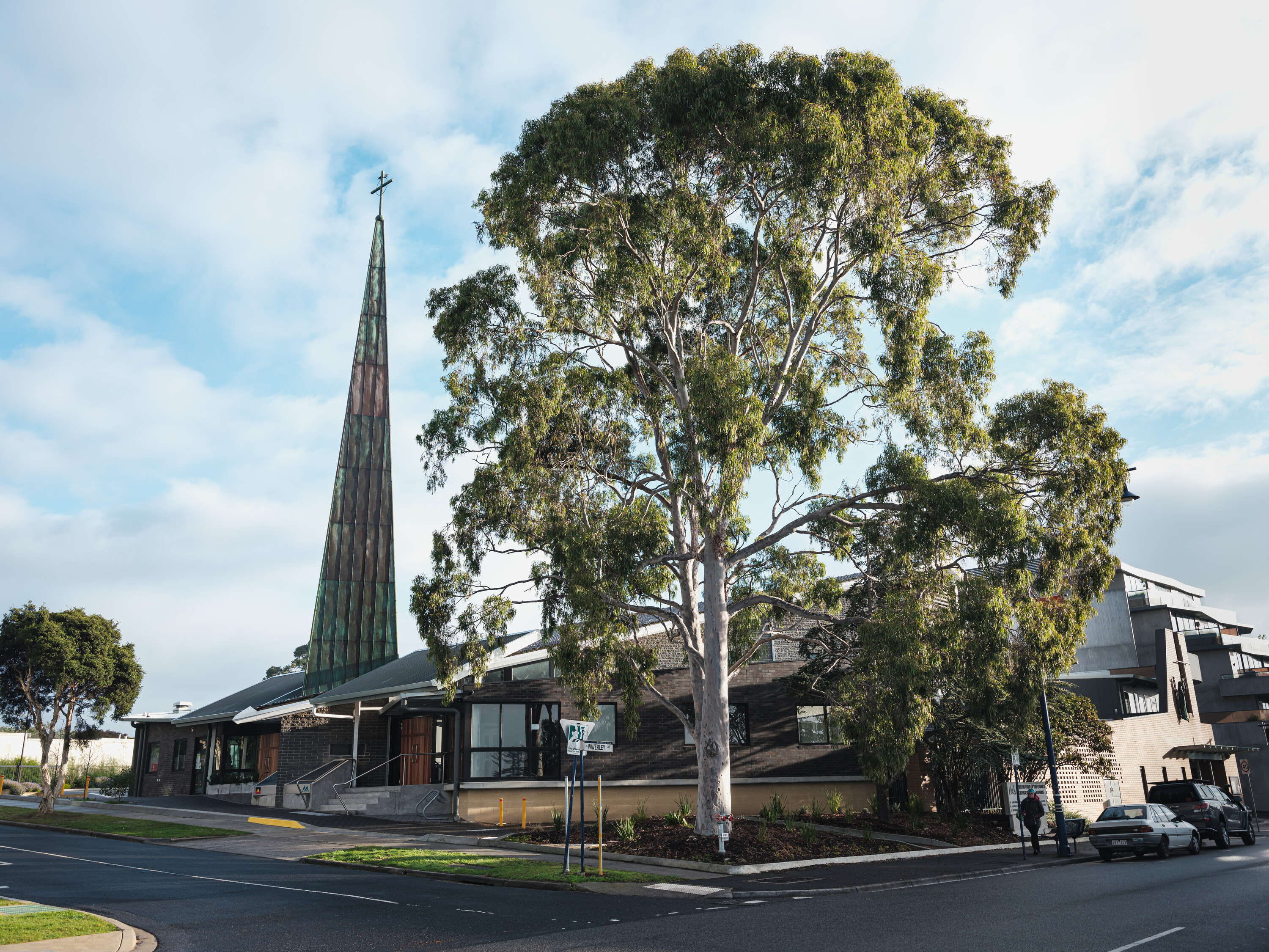 <p>Exterior view of Mary Immaculate Church from Heidelberg Road showing the retained spire of the 1960 version by Mockridge, Stahle & Mitchell and the recent additions by FPPV Architecture surrounding it. Photograph by Caitlin Wong.</p>