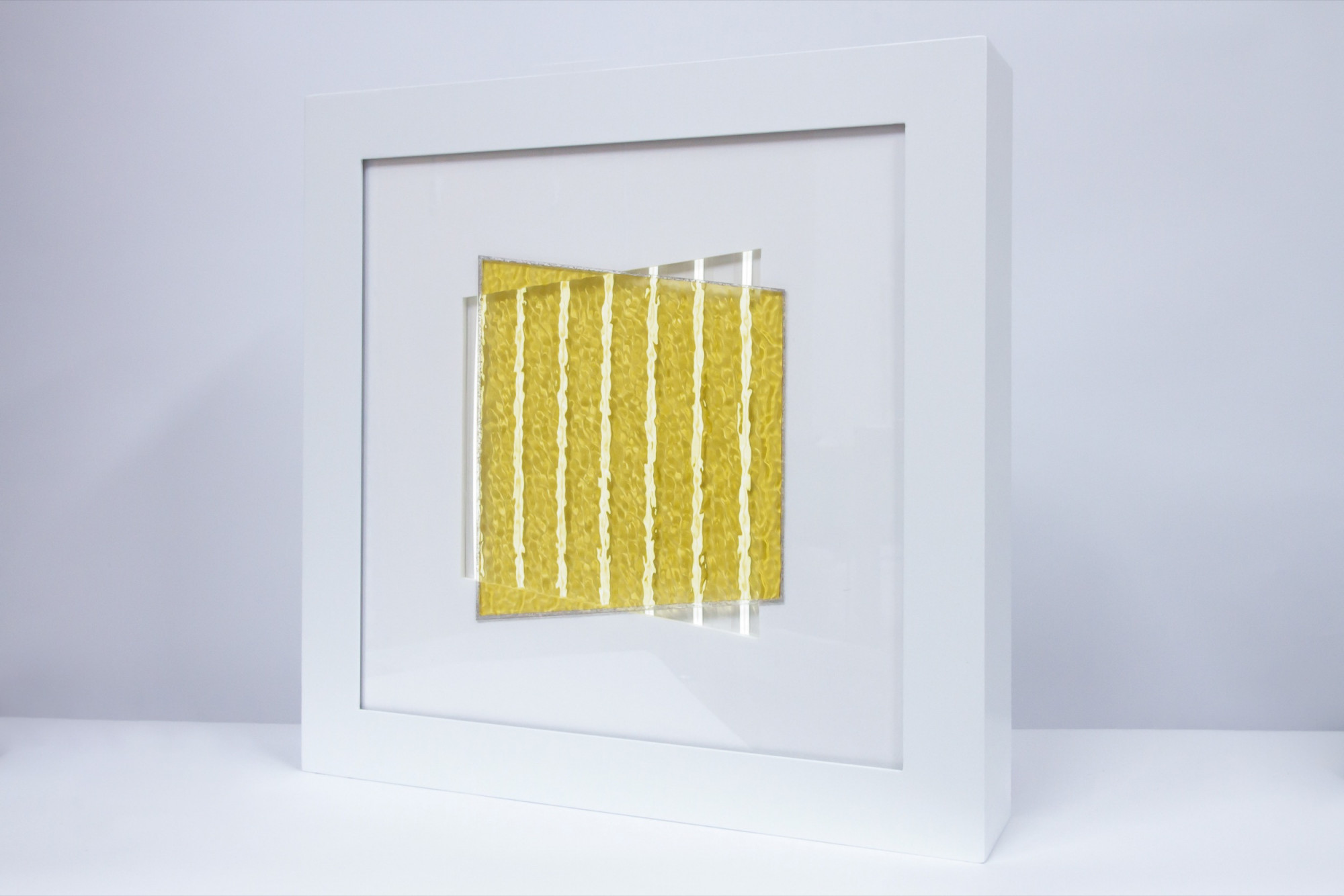 Meagan Streader, Yellow, vertical, 2020. Ripple glass, electroluminescent tape, aluminium, enamel, acrylic, foam core, electronic components, 50 x 50 x 10 cm.