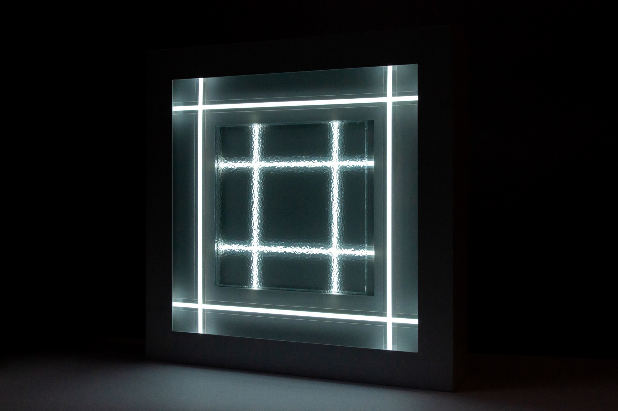 Meagan Streader, Tower, tunnel, 2020. Ripple glass, electroluminescent tape, aluminium, enamel, acrylic, foam core, electronic components. 50 x 50 x 10 cm.