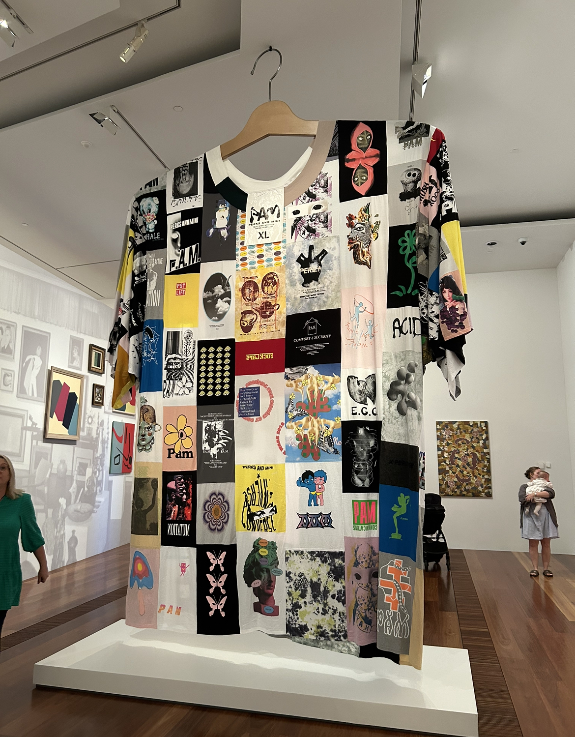 Installation view of P.A.M.’s <em>Self portrait with t-shirts</em>, 2022, <em>Melbourne Now</em>, The Ian Potter Centre: NGV Australia, Melbourne. Photo: Cam Hurst