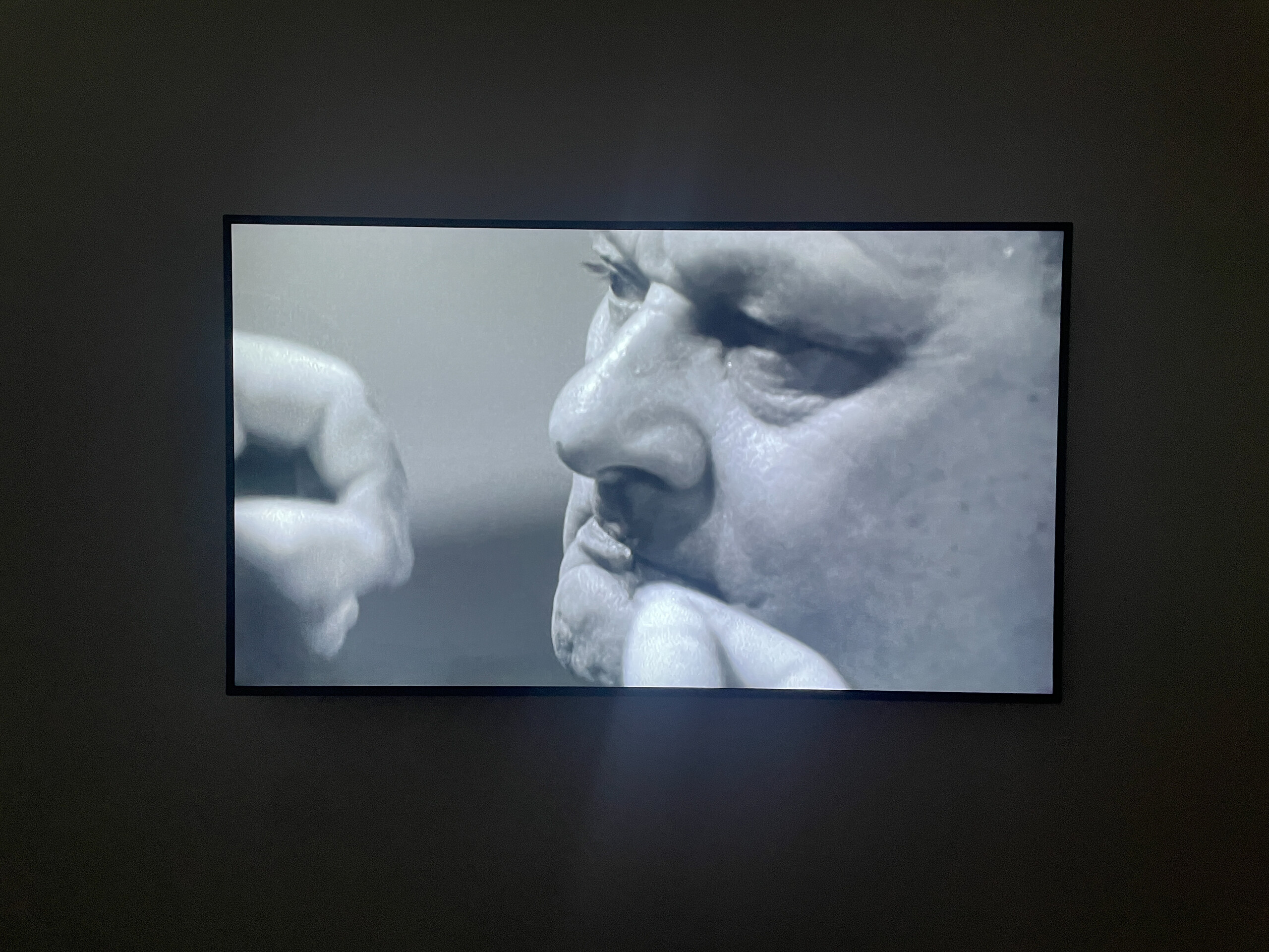 Installation view of Mike Parr, <em>Sunset Claws</em>, <em>Part 3: Going Home</em>, detail of <em>Close the Concentration Camps</em> (2002) in <em>Montage in Space &amp; Time</em> (1971–2016). Anna Schwartz Gallery, Melbourne, 2023.