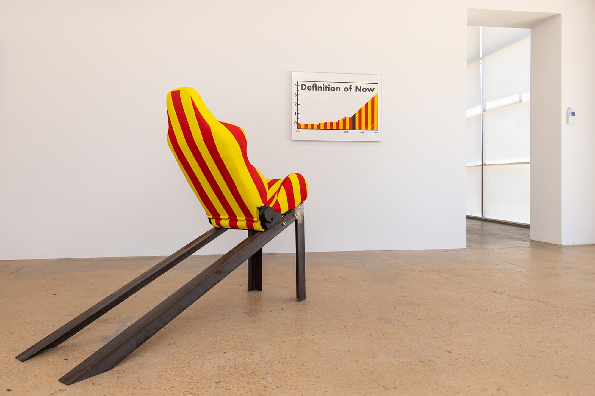 Burchill/McCamley, <em>Autorecliner</em>, 2015, steel, dye print on fabric, car seat, 133 x 160 x 50 cm, and <em>Definition of Now</em>, 2021, Acrylic screen print on paper 75 x 100 cm. Courtesy of NAP Contemporary.