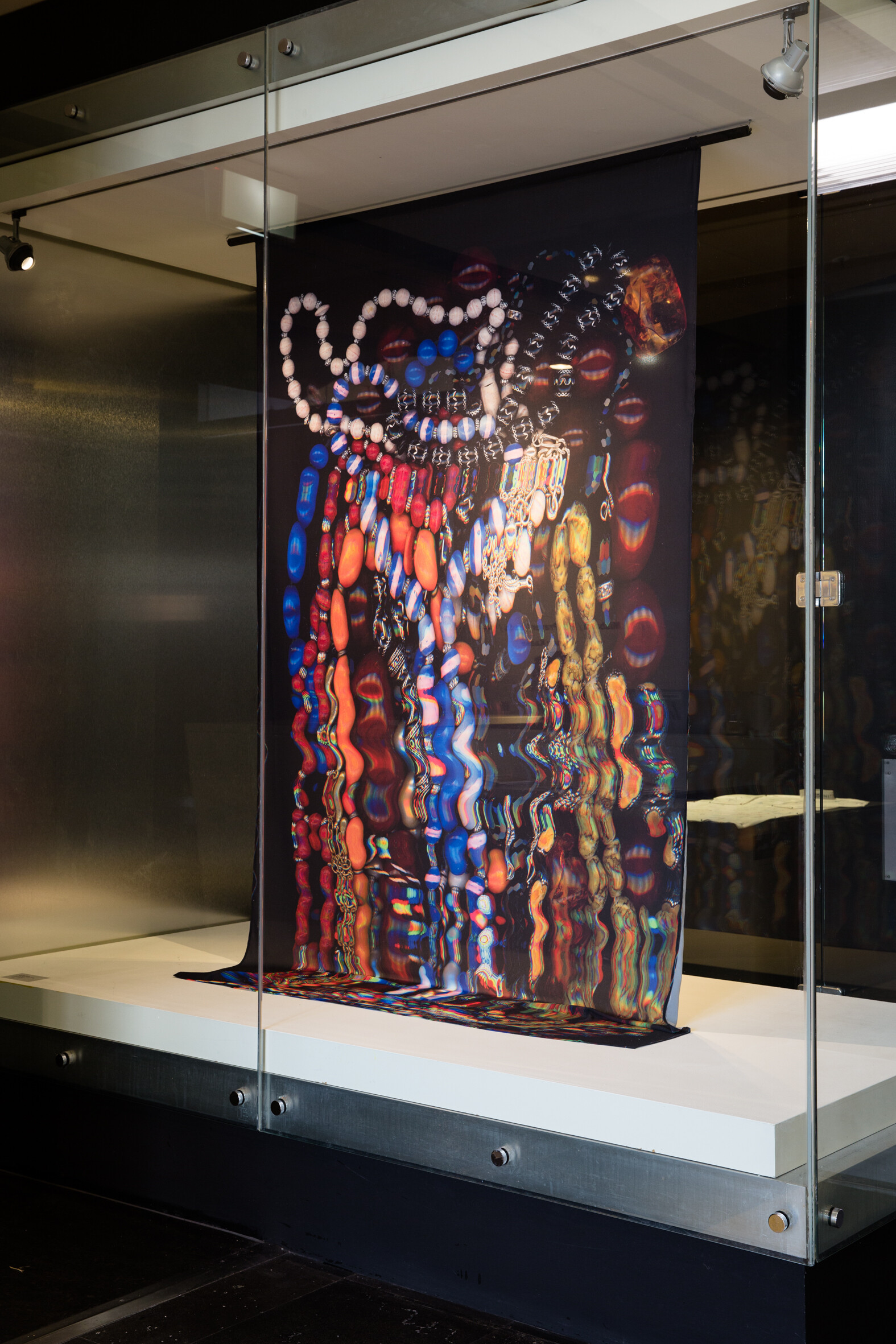 <p>Installation view of Ayman Kaake, <em>The Prayer Beads</em>, 2025, print on fabric, 140 x 240 cm. Photo: Ayman Kaake</p>