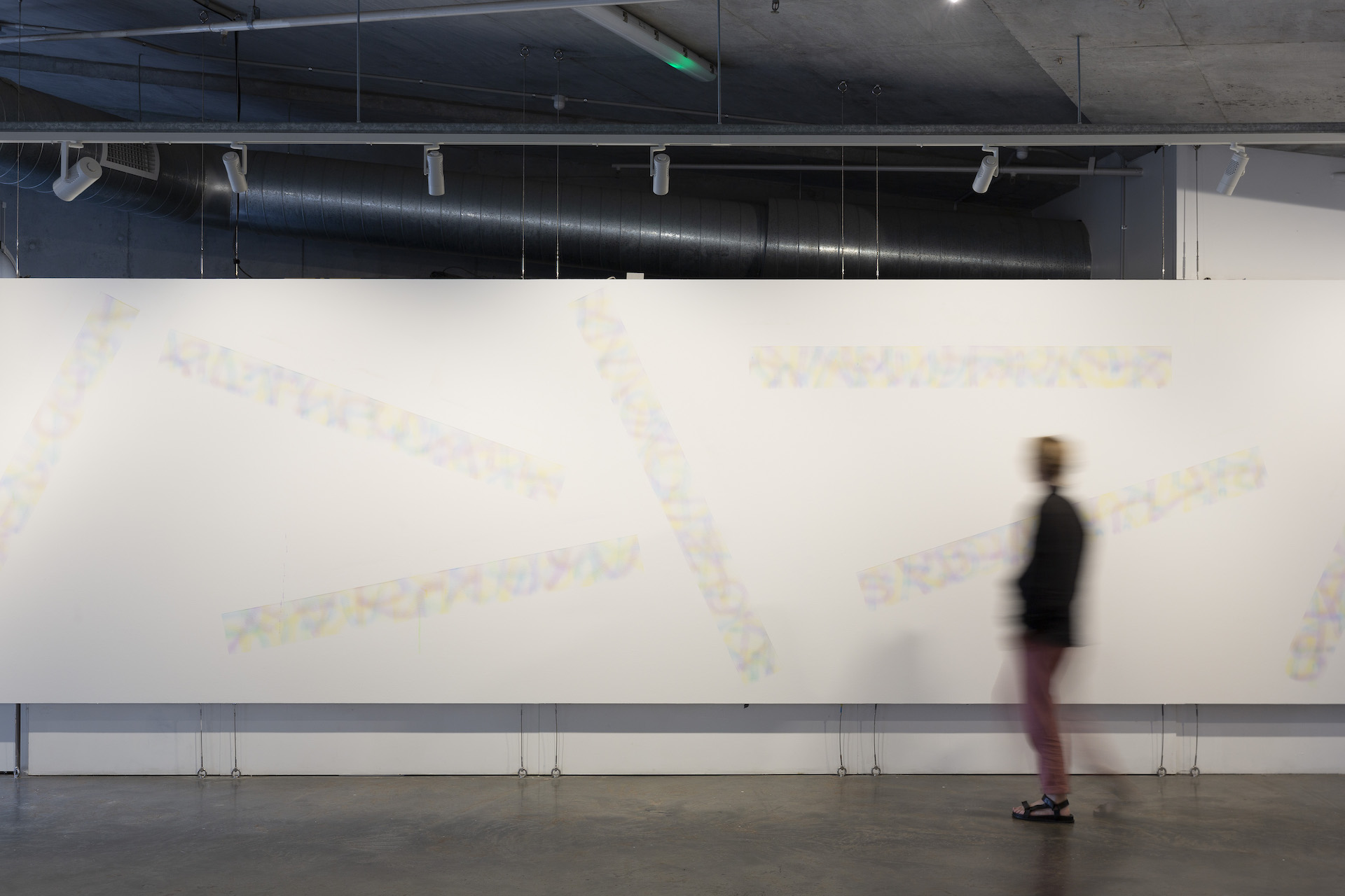 Kenzee Patterson, <em>Seven Sleepers</em>, 2023, diffused water and ink on gallery wall. Photograph: Jessica Maurer