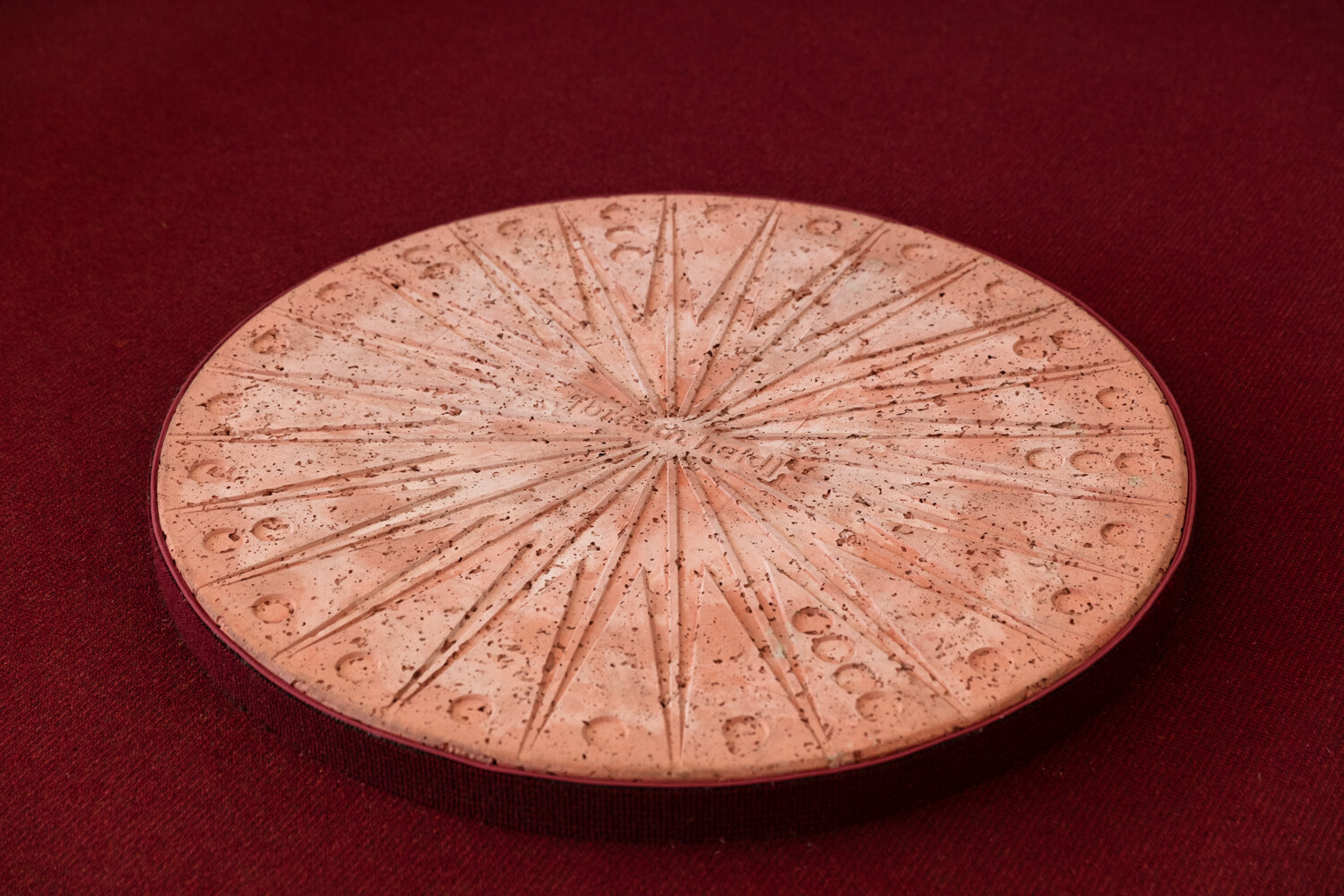 <p>Tina Stefanou, ‘Motet Fail’, 2026, concrete, carpet, wood, stone, granite, sand, beeswax, fire, installation view, West Space. Photography by Janelle Low.</p>