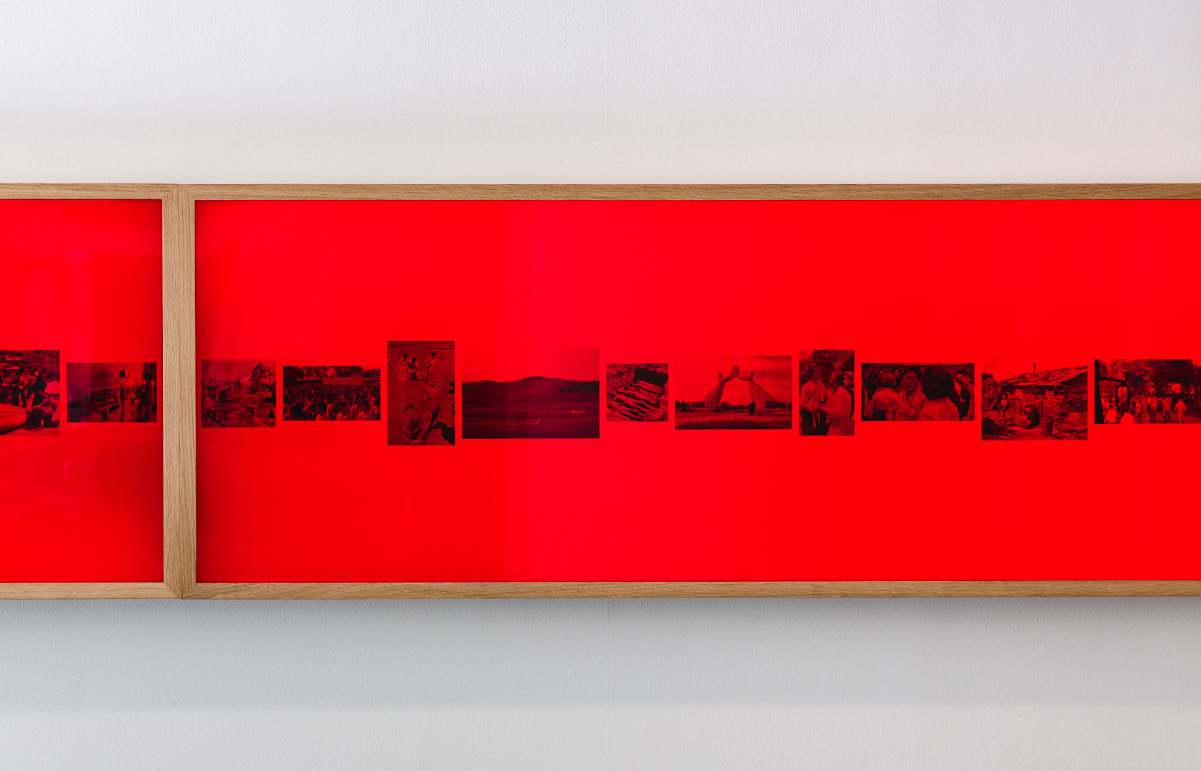 Installation view. Jane Jin Kaisen, Apertures | Specters | Rifts, 2016, triptych handcrafted oak light box, 36 B&amp;W photographs, 52.8x508.4x10 cm, Korean Cultural Centre Australia, Sydney, 2022. Image courtesy the artist, Korean Cultural Centre Australia.