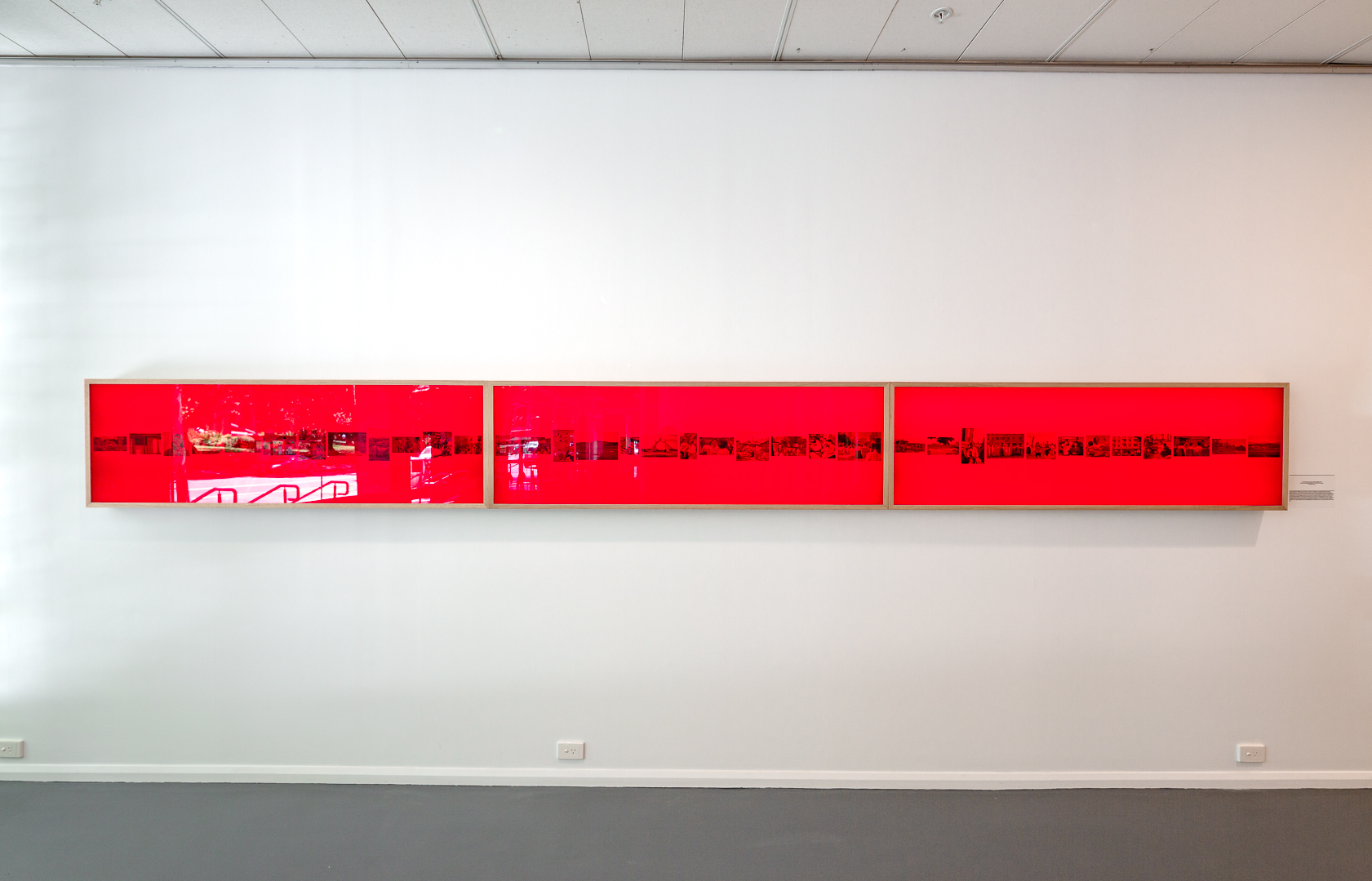 Installation view. Jane Jin Kaisen, Apertures | Specters | Rifts, 2016, triptych handcrafted oak light box, 36 B&amp;W photographs, 52.8x508.4x10 cm, Korean Cultural Centre Australia, Sydney, 2022. Image courtesy the artist, Korean Cultural Centre Australia.