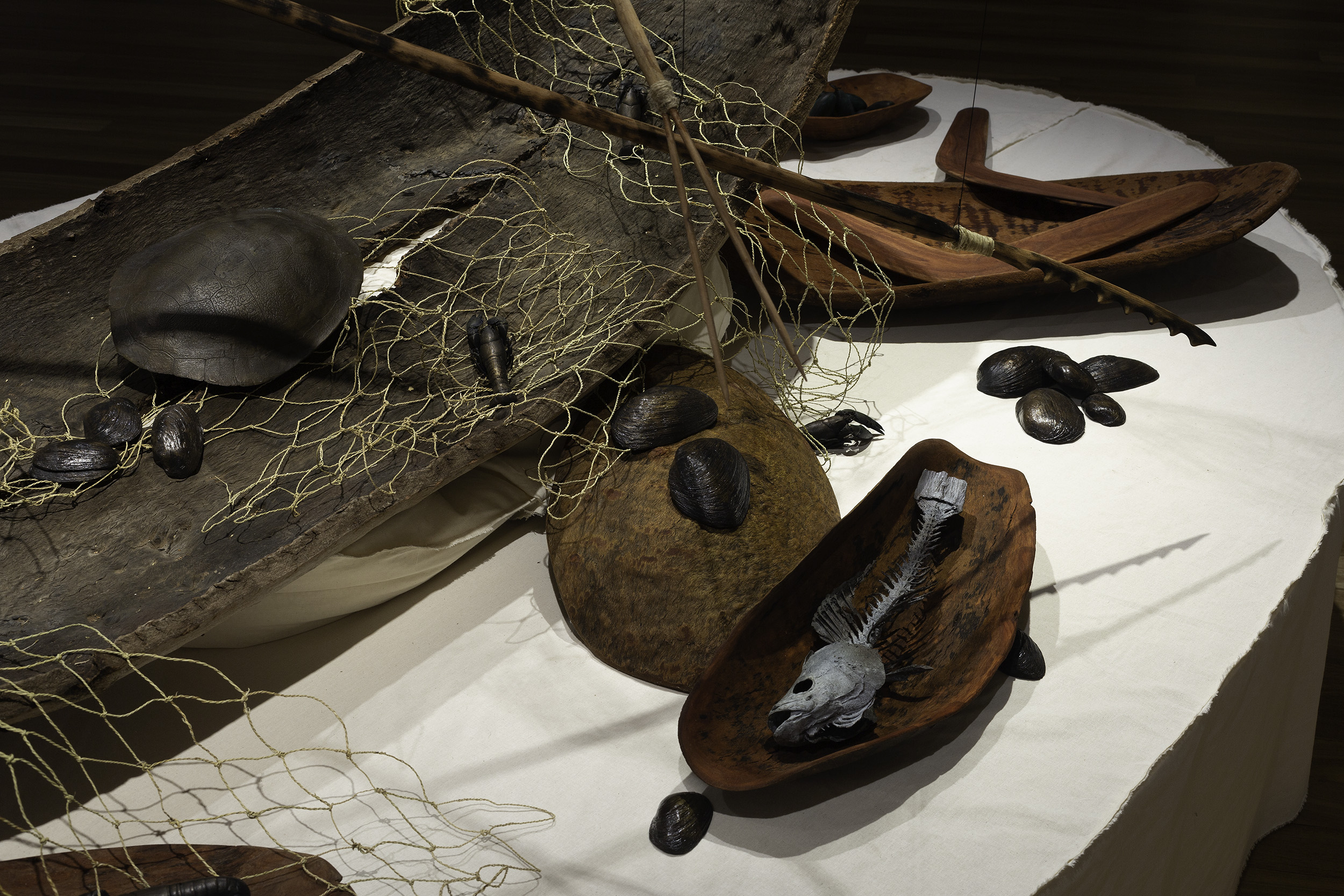 <p>David Doyle, Barkindji/Malyangapa people, <em>kamuru – river red gum</em>, 2022–23 (detail). </p><p>Nici Cumpston, Zena Cumpston, David Doyle, Kent Morris, Adrianne Semmens, Raymond Zada, Barkandji/Barkindji/Malyangapa people, <em>nets</em>, 2023 (detail). Installation view of Bunjil Place Gallery, 2024. Courtesy the artists. Photo: Christian Capurro</p>