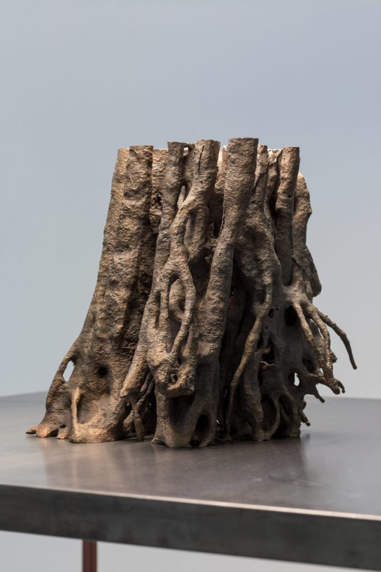 Nicholas Mangan, Termite Economies (Root Cause) (detail), 2019, Bronze, steel and ply table and custom lighting, Dimensions variable. Photography: Andrew Curtis.