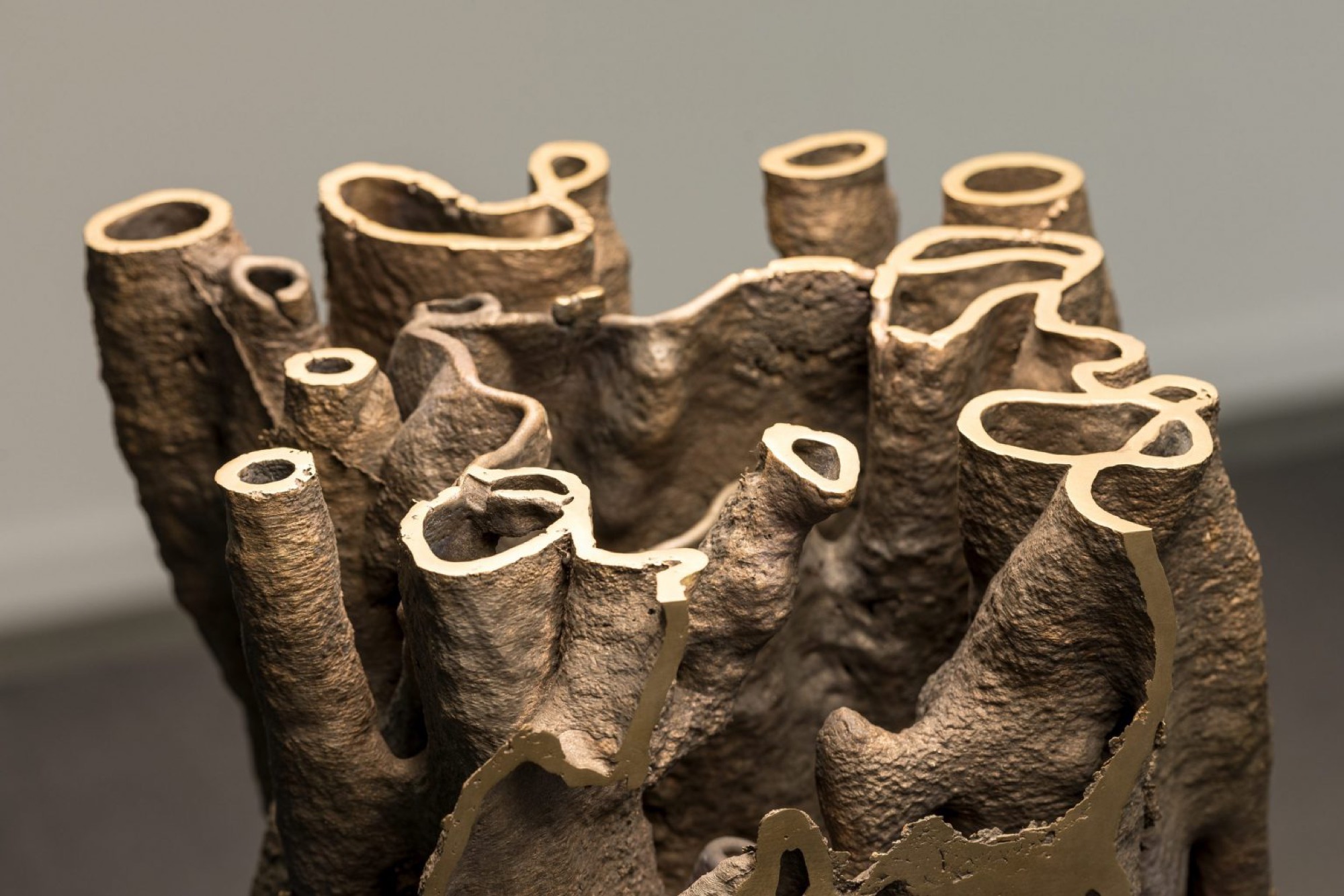 Nicholas Mangan, Termite Economies (Root Cause) (detail), 2019 , Bronze, steel and ply table and custom lighting , Dimensions variable. Photography: Andrew Curtis.