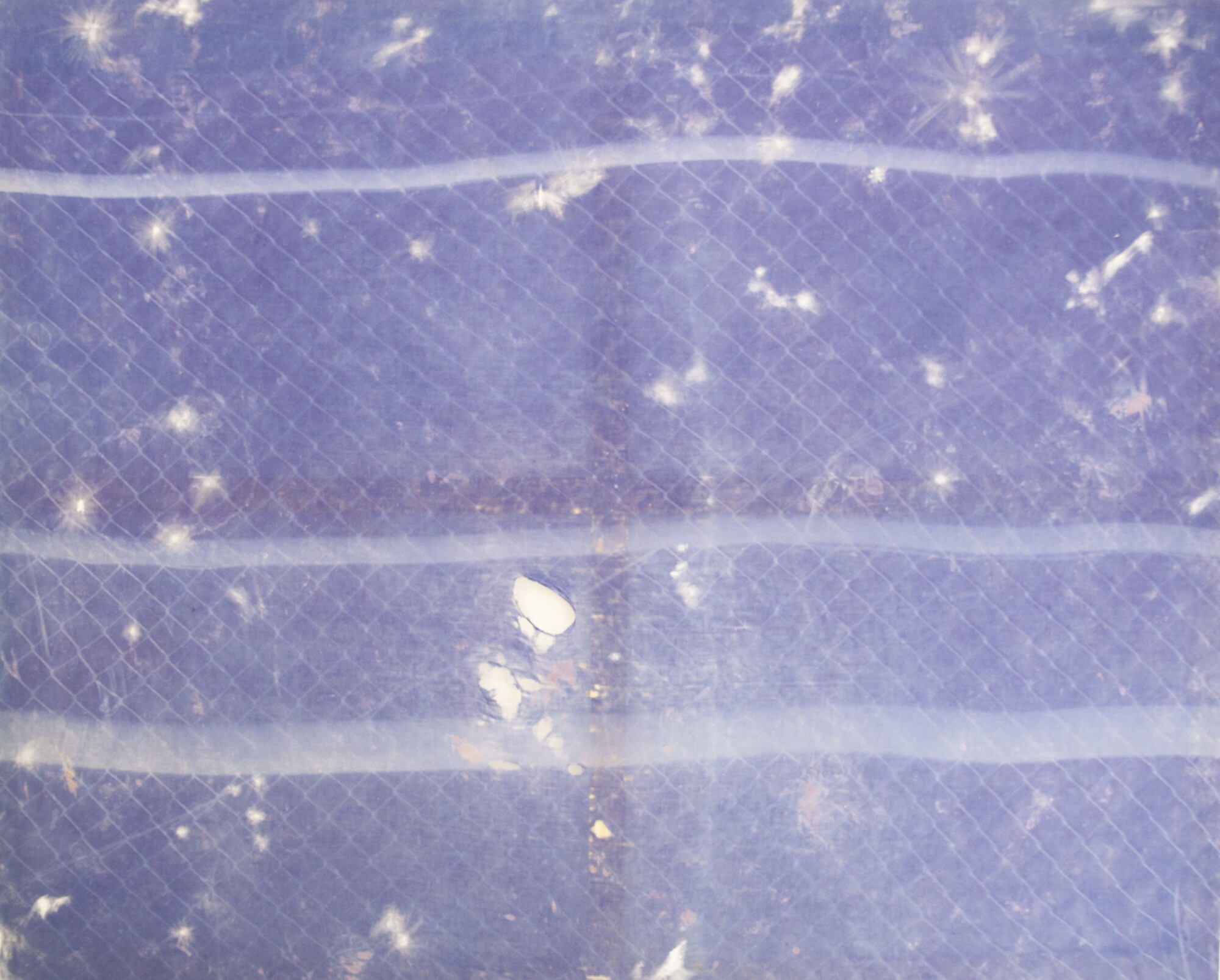 Nicole Thomson, <em>Fence</em>, 2022 (detail), cyanotype, stains, enamel on linen sheet, 181 x 226 cm, 2022. Photo: Alexandra Hobba
