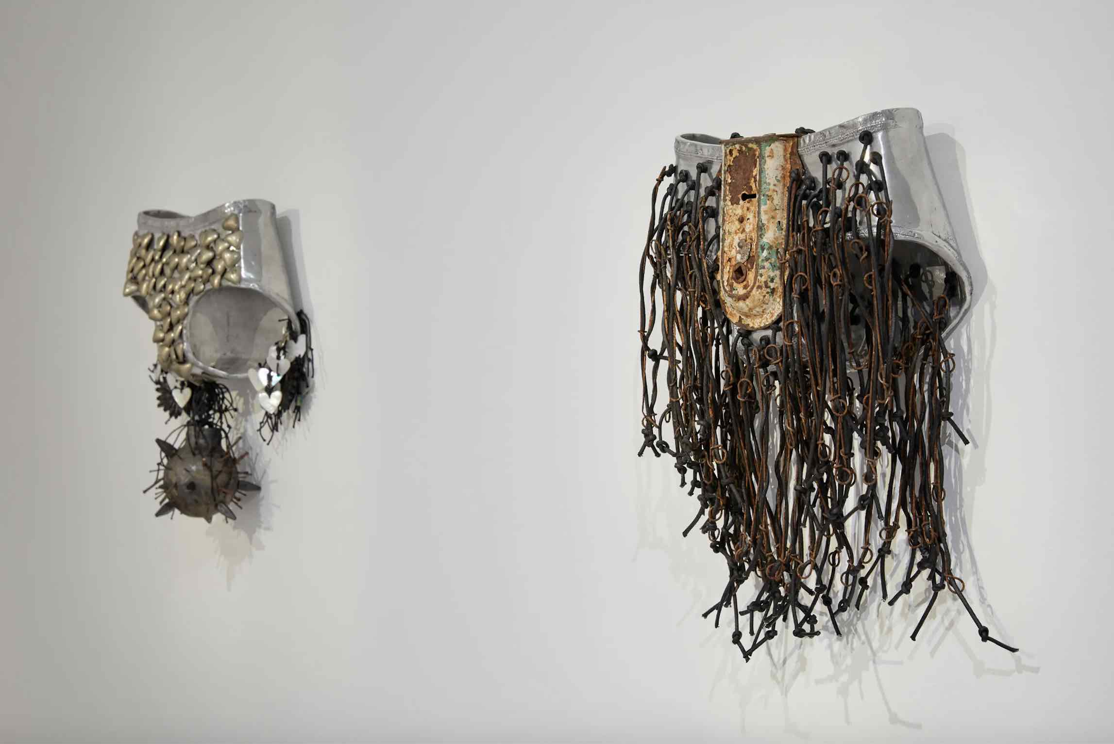 Karla Dickens, <em>Warrior Woman VIII</em>, and <em>Warrior Woman XVII</em>, 2017, aluminium underwear, mixed media, dimensions variable, Murray Art Museum Albury. Photo: Jeremy Weihrauch