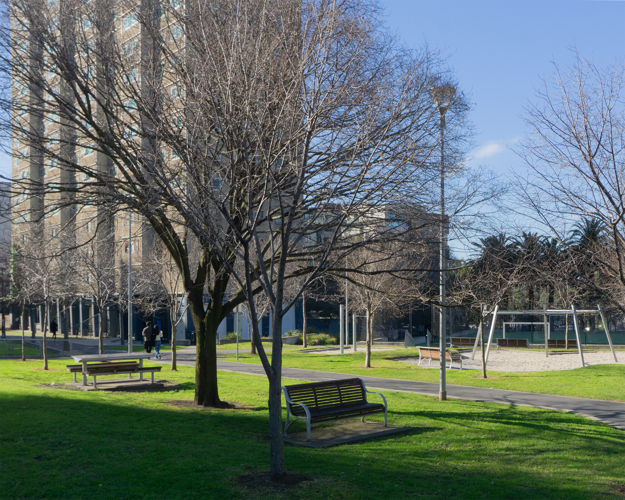 <p>A pathway network enables Drummond Street to continue through the centre of the public housing towers. Photograph by Veronica Charmont.</p>
