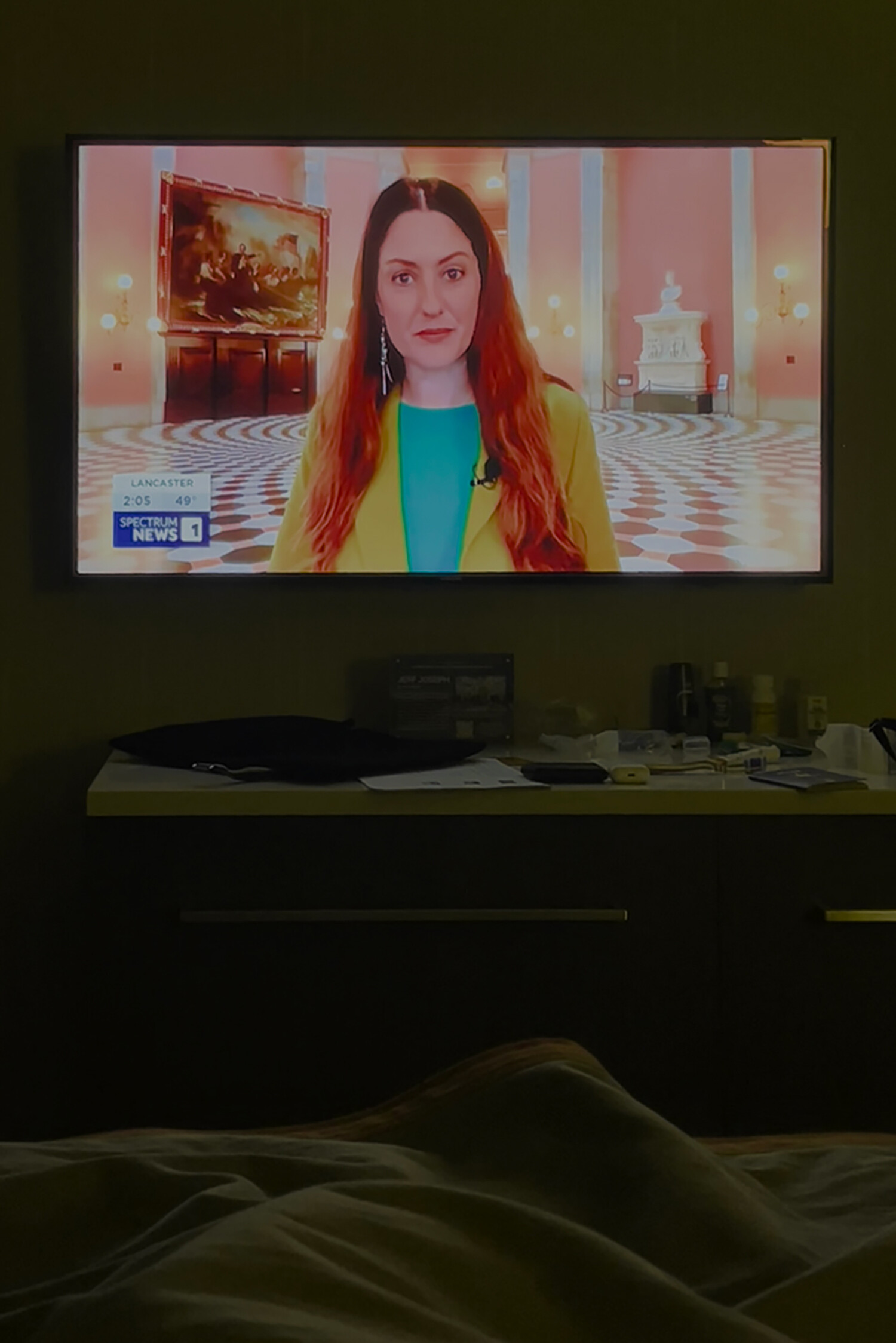 <p>A news report on the Wexner-Epstein scandal on a television in the same hotel room as the pillow in the previous photograph. Photo: Andrew Power.</p>