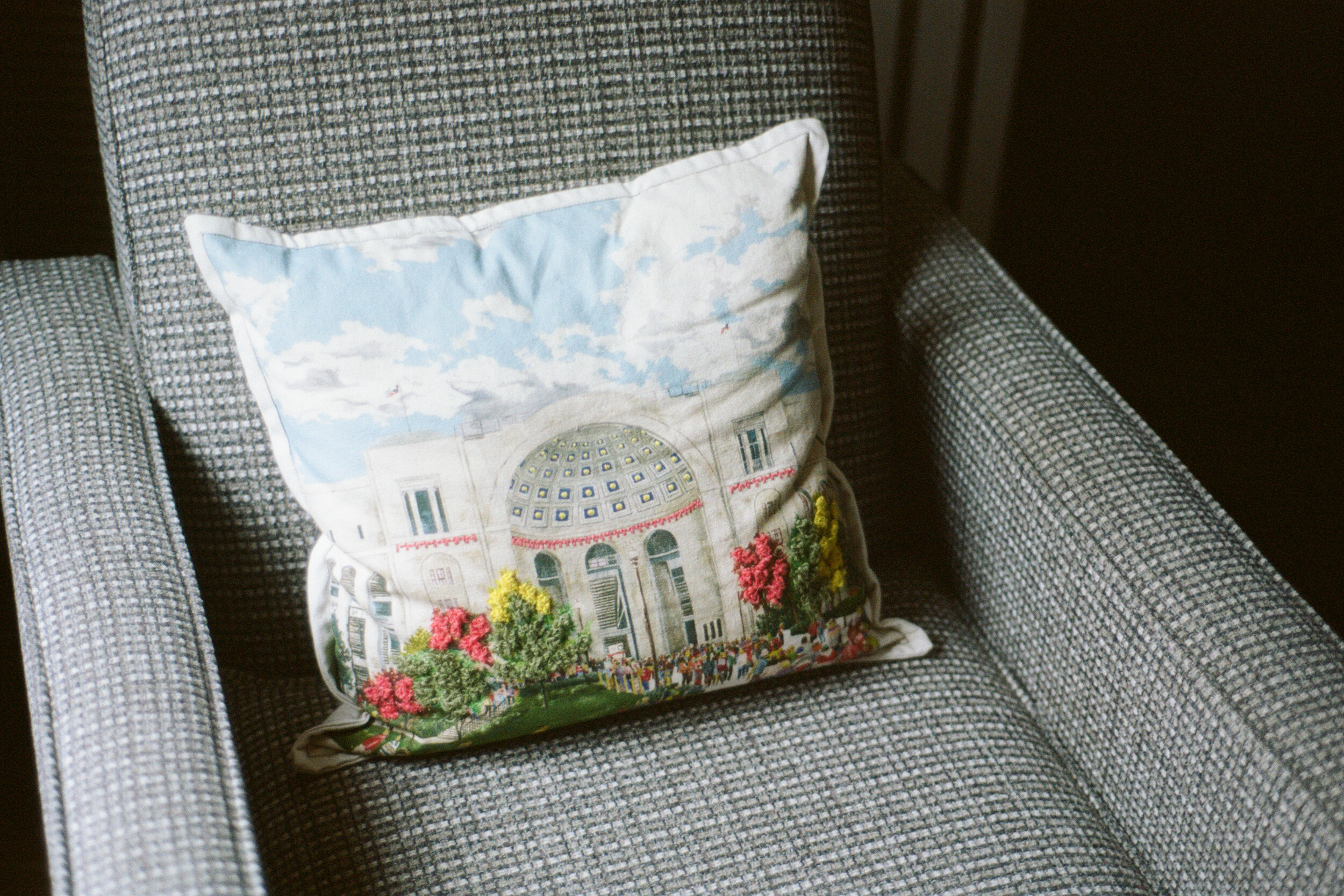 <p>A pillow depicting an entrance to Ohio Stadium in a hotel room at Ohio State University. Photo: Andrew Power.</p>
