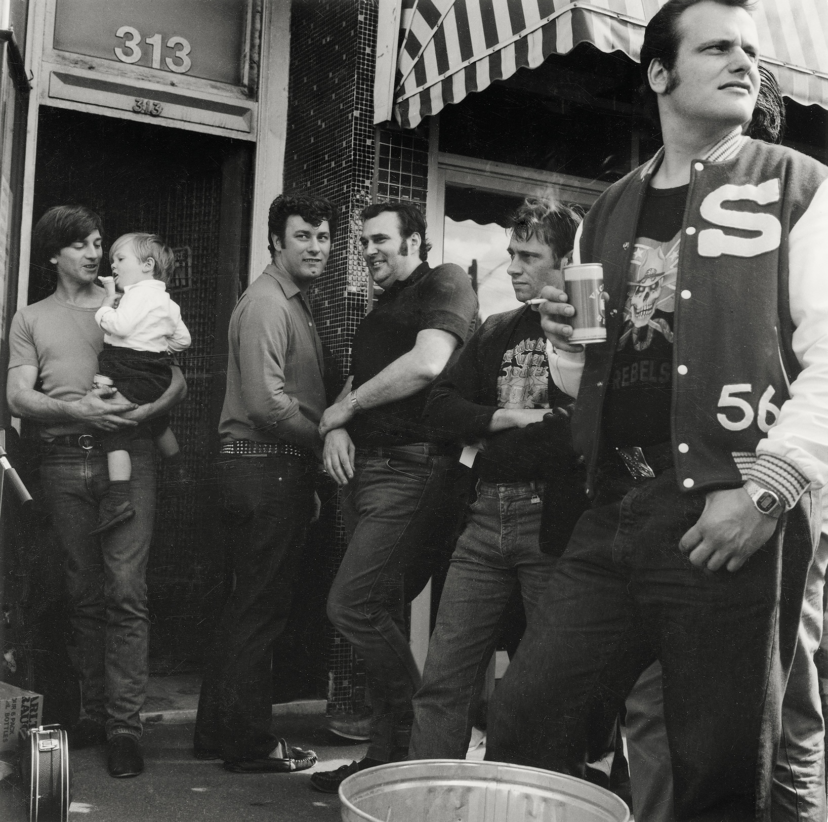 <p>Viva Gibb, <em>Denys Williams outside Hound Dog’s Bop Shop, 313 Victoria Street, West Melbourne</em>, 1984, silver gelatin print, 20.5 × 16.5 cm. Donated by Sybil Gibb and Rupert Duffy to the Melbourne Art Trust in memory of Viva Gibb 2025, © Courtesy of the Estate of Viva Gibb.</p>