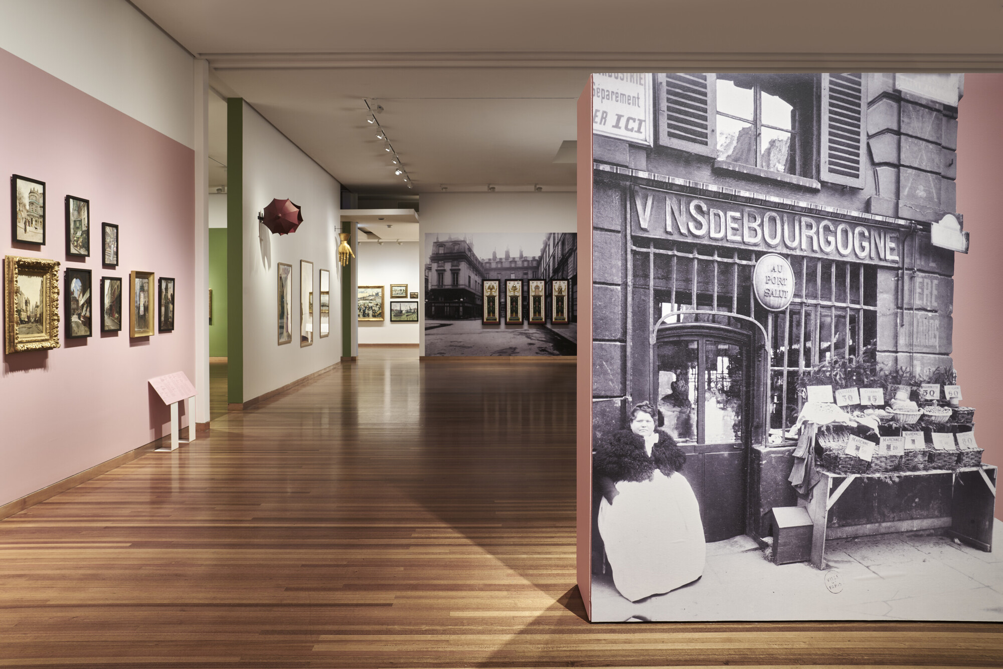 <p>Installation view of <em>Market Town Show</em>, themed room in <em>Paris: Impressions of Life 1880–1925</em>, Bendigo Art Gallery. Image courtesy of Bendigo Art Gallery. Photo: Leon Schoots</p>