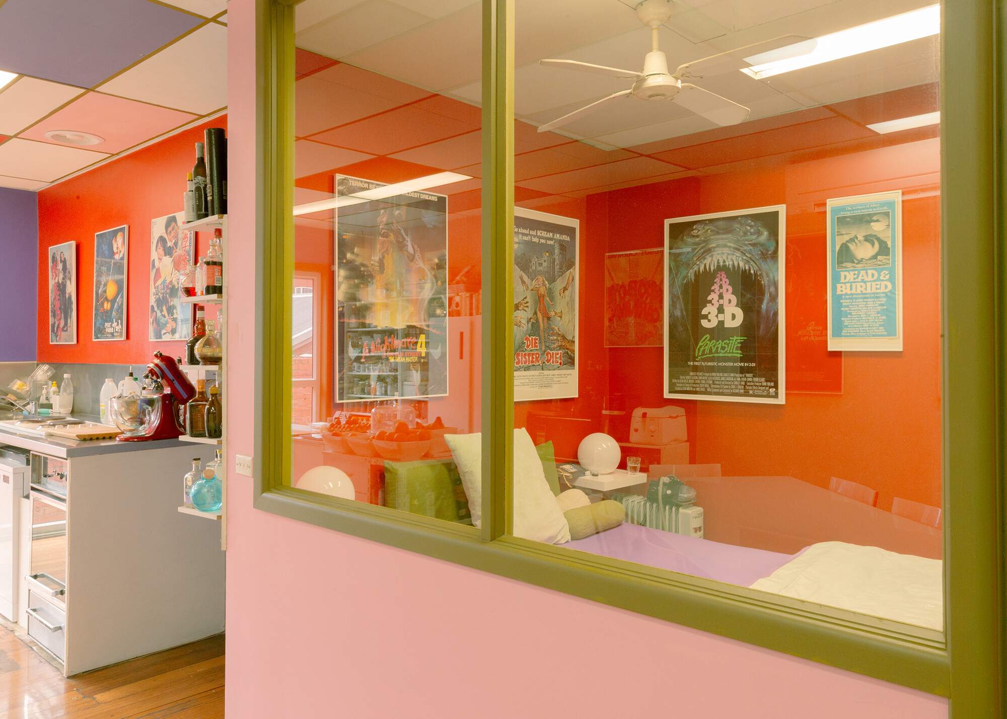 <p>A closer view of the retained partitions that now enclose the bedroom with the retained mid-olive green paint. Photograph by Laura Banfield.</p>