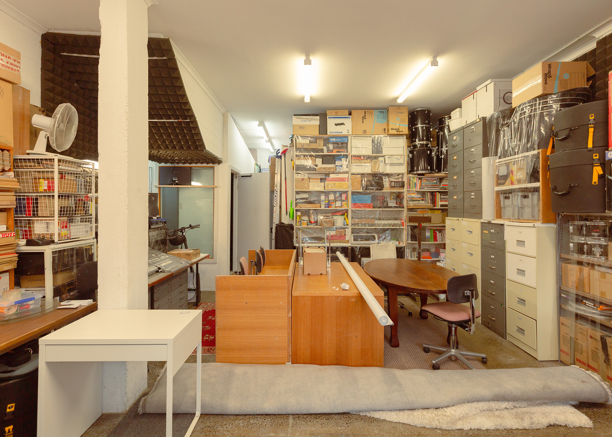 <p>The lower level, with a recording studio and a studio beyond. Photograph by Laura Banfield.</p>