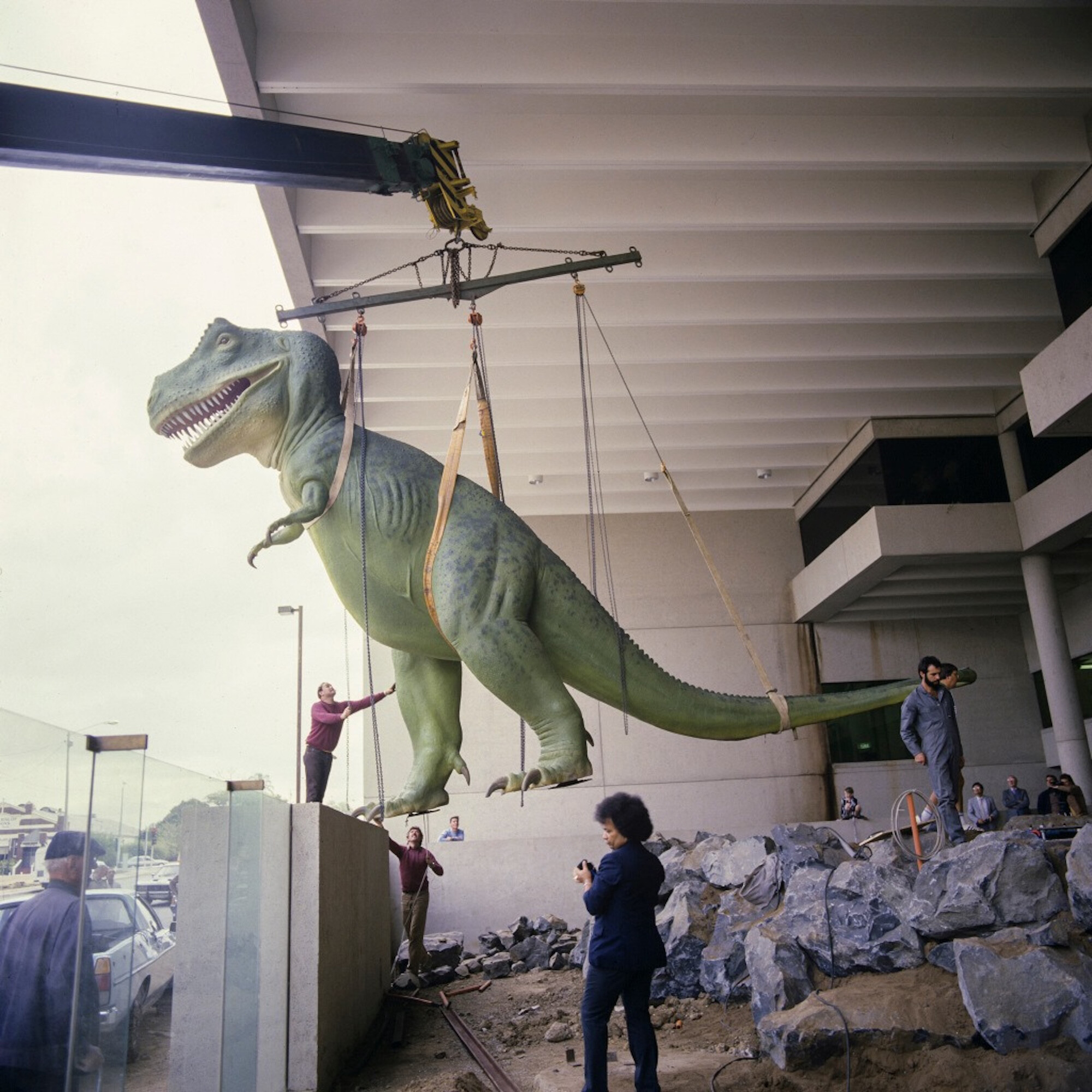<p>Brisbane kitsch. It’s still there. Courtesy of <a href="https://www.facebook.com/qldmuseum/photos/throwback-to-1986-when-tyrranosaurus-rex-was-installed-at-south-bank-after-movin/2624494747581305/">Queensland Museum Kurilpa</a>, 1986.</p>