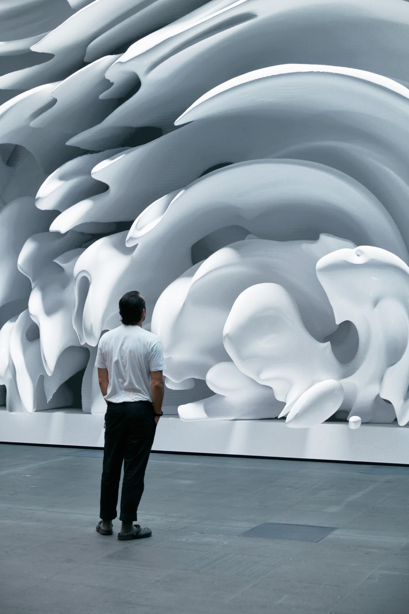 NGV Triennial 2020 installation view of Refik Anadol (designer); Refik Anadol Studio, Los Angeles (design studio) <em>Quantum memories</em> 2020. Commissioned by the National Gallery of Victoria, Melbourne. Proposed acquisition with funds donated by Loti & Victor Smorgon Fund and Barry Janes and Paul Cross, 2020 © Refik Anadol. Photo: Tom Ross