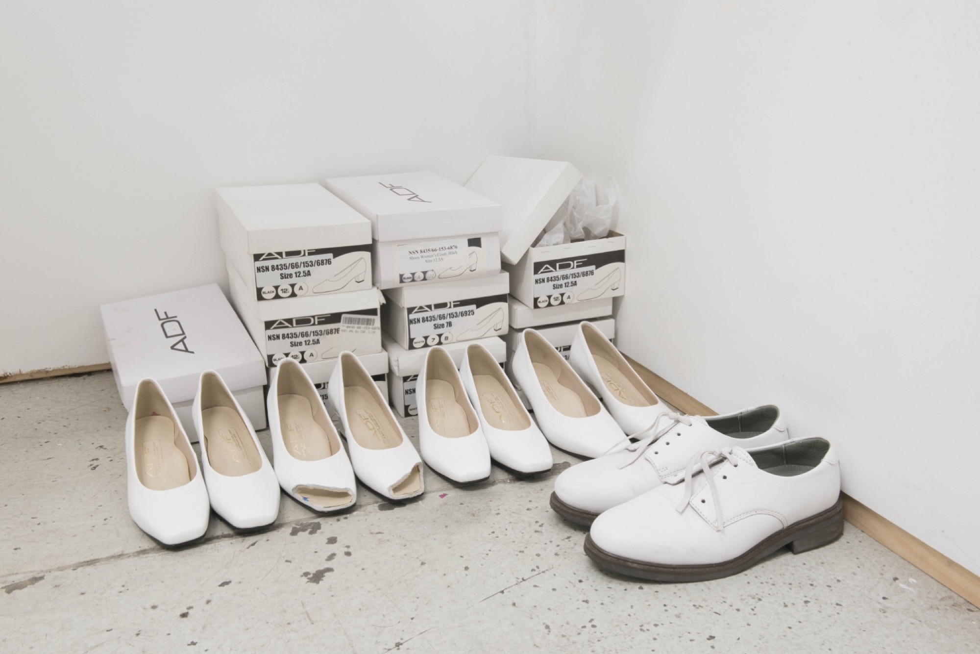 Rex Veal, <em>Parade Shoes</em>, 2020, Archive Australian Defence Force leather shoes and shoe boxes, dimensions variable. Bossy’s Gallery. Courtesy of Bossy’s gallery. Photo: Jordan Halsall.