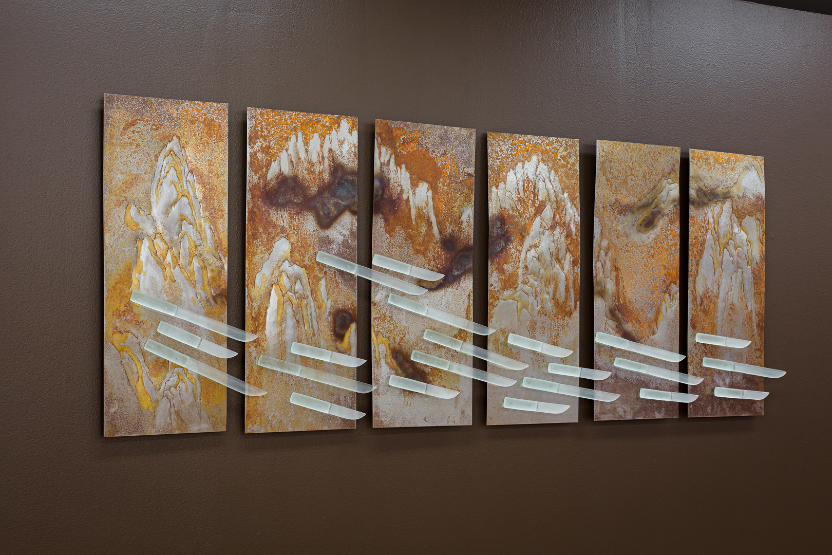 NC Qin, Flow: <em>River of Knives</em>, 2021, hammered and rusted steel panels, fused and carved plate glass, neodymium magnets, 185cm × 80cm × 7cm. Photo: Document Photography.