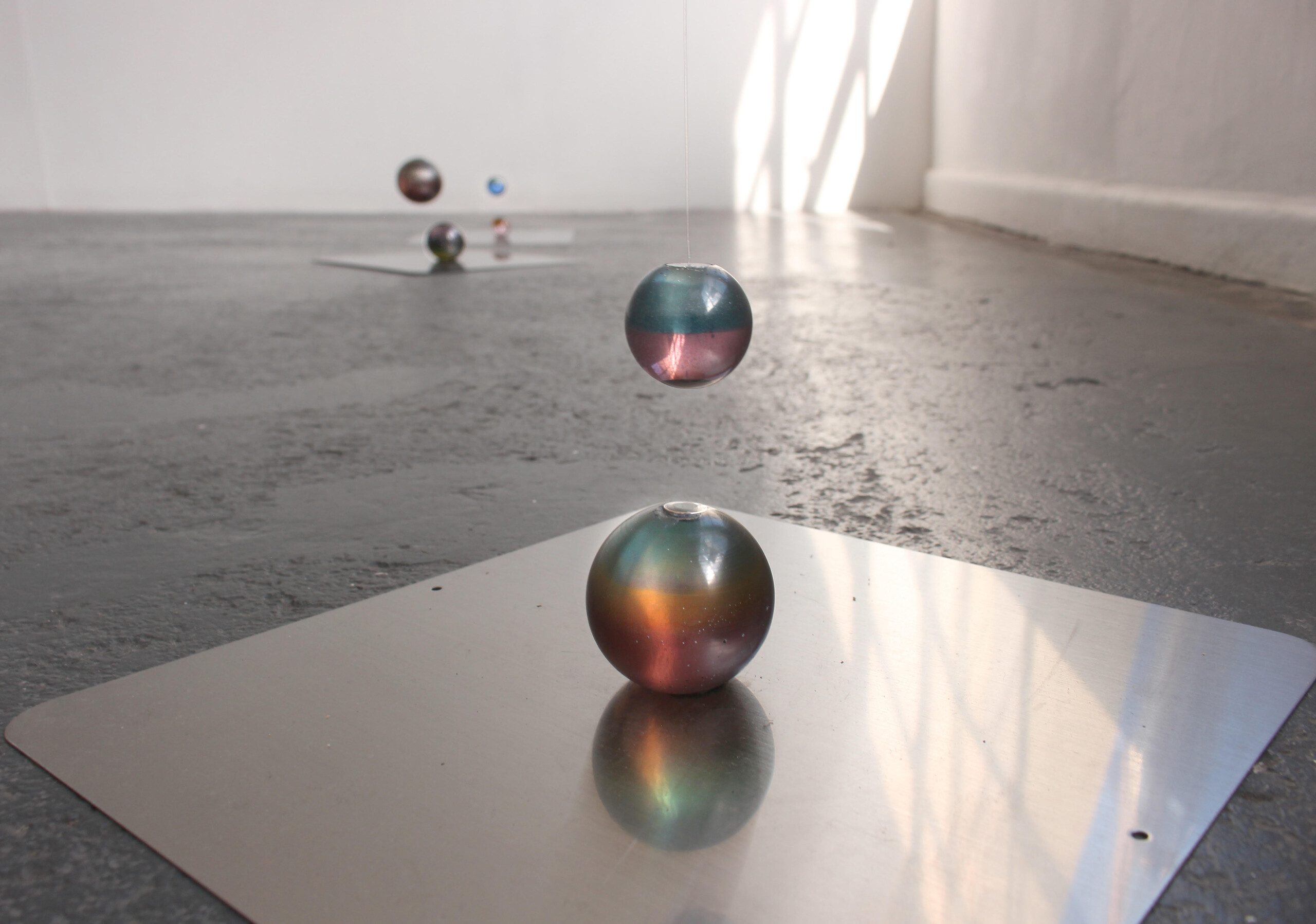 Installation view of Gabriella D’Costa, <em>Motion Holders</em>, 2022, resin, stainless steel and thread, Blindside ARI, Melbourne. Photo: Courtesy of the artist