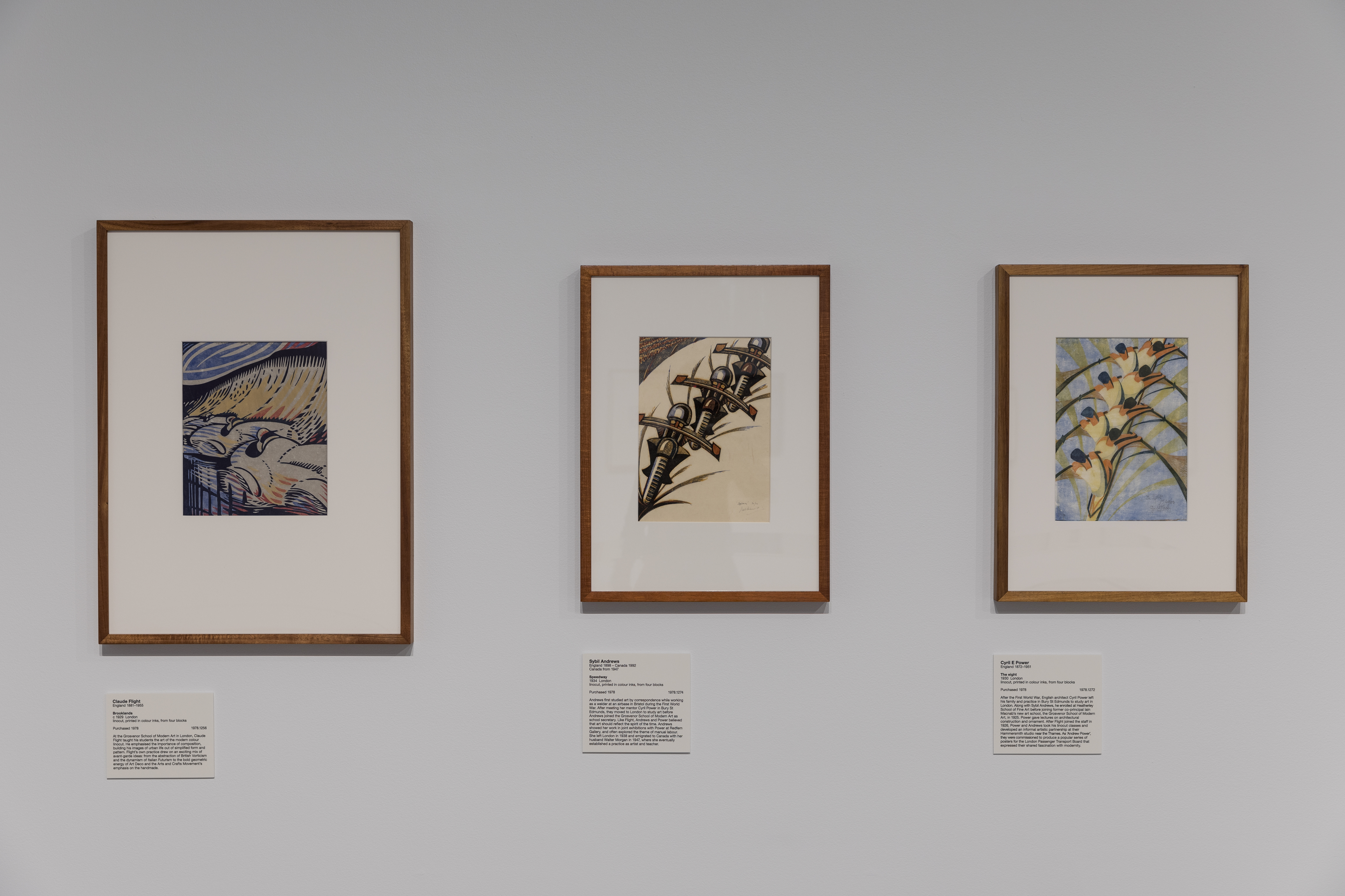 Artworks by Claude Flight (left), Sybil Andrews (centre) and Cyril Power (right) in <em>Spowers & Syme</em>, installation view. Courtesy of Geelong Art Gallery. Photographer: Andrew Curtis