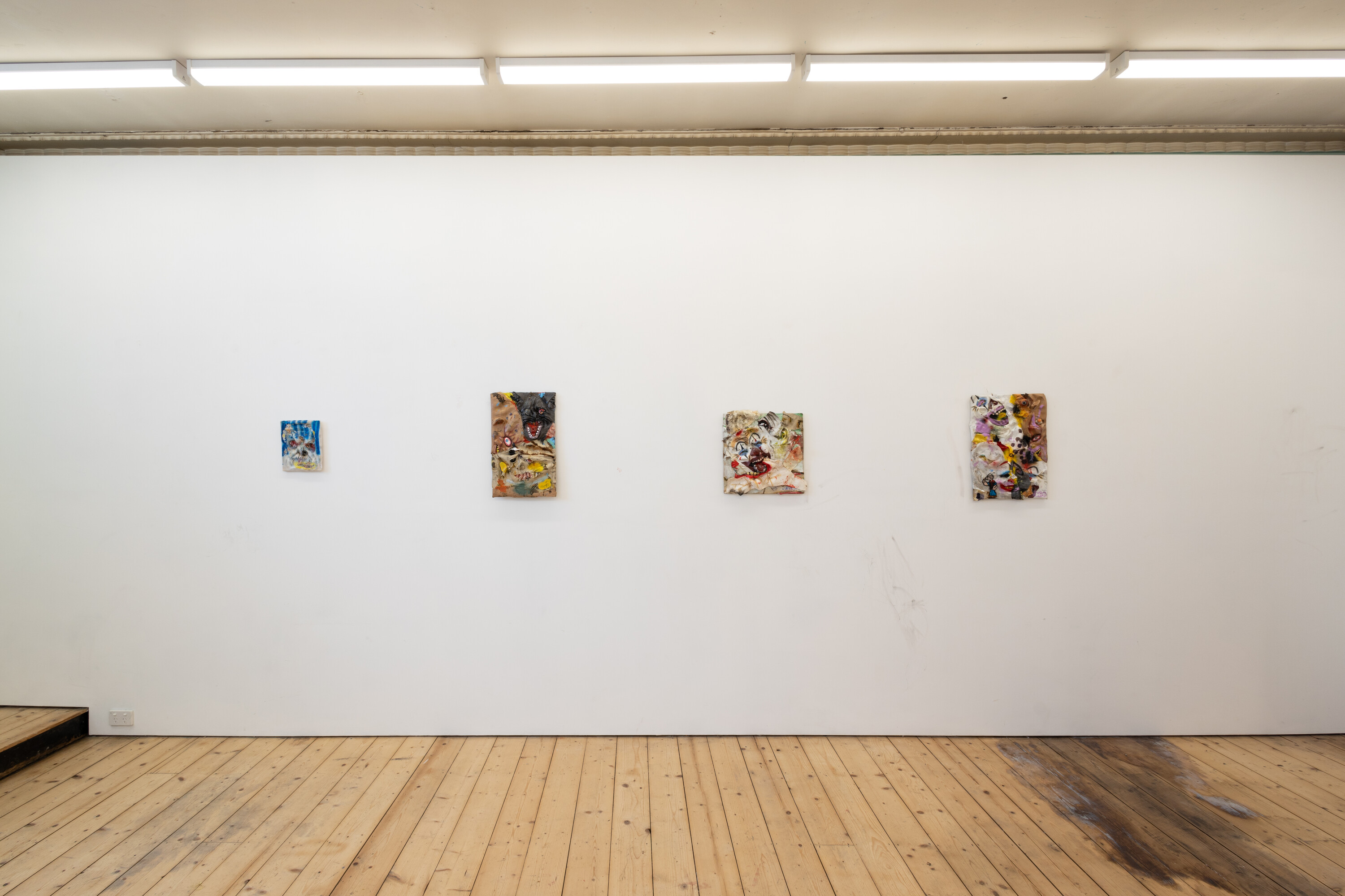 <p>Installation view of Ben Hughes, <em>Sweet</em>. Left to right, <em>Rugby </em>2024, 20 X 25cm, Plastic bag, ink, silicone, enamel and glass on canvas board. <em>Mickey Wands All Day </em>2024, 33 X 53cm, Latex, silicone, oil paint, enamel and glass on wooden board. <em>Circus Crystal </em>2024, 40 X 40cm, Latex, silicone, oil paint, enamel and glass on wood board.<em> The Boys </em>2024, 37 X 52cm, Latex, silicone, oil paint, ink on wood board. <em>Strawberry. </em>Photo courtesy: Nicholas Mahady and <em>Strawberry</em></p>