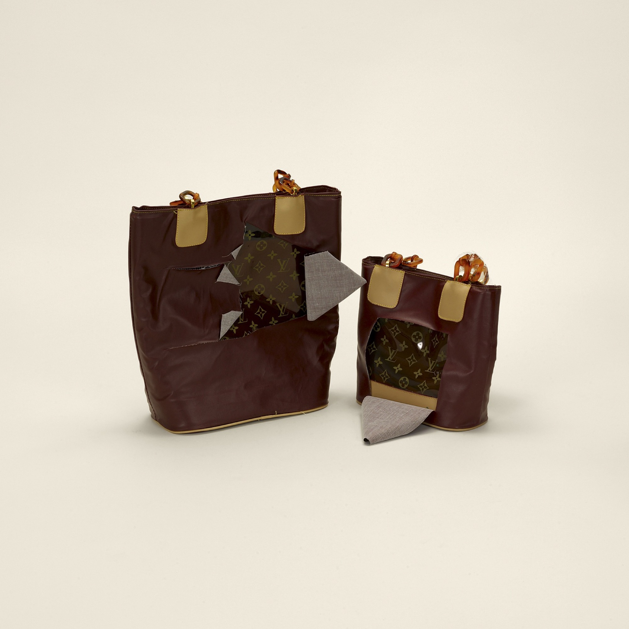 “Handbags, Louis Vuitton (disguised) (counterfeit)” (Detail) Handbags, Louis Vuitton (Counterfeit)<em>, Contraband</em>, 2010 Archival inkjet print 15.9 x 15.9 cm © Taryn Simon. Courtesy Gagosian and Anna Schwartz Gallery.