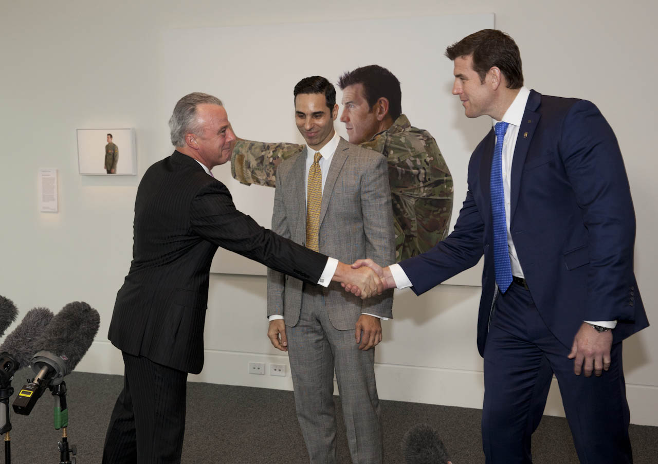 Launch of Ben Roberts-Smith VC portraits by artist Michael Zavros, 2 September 2014 with Brendan Nelson, Michael Zavros, and Ben Roberts-Smith (left to right). Photo: Adam Kropinski-Myers