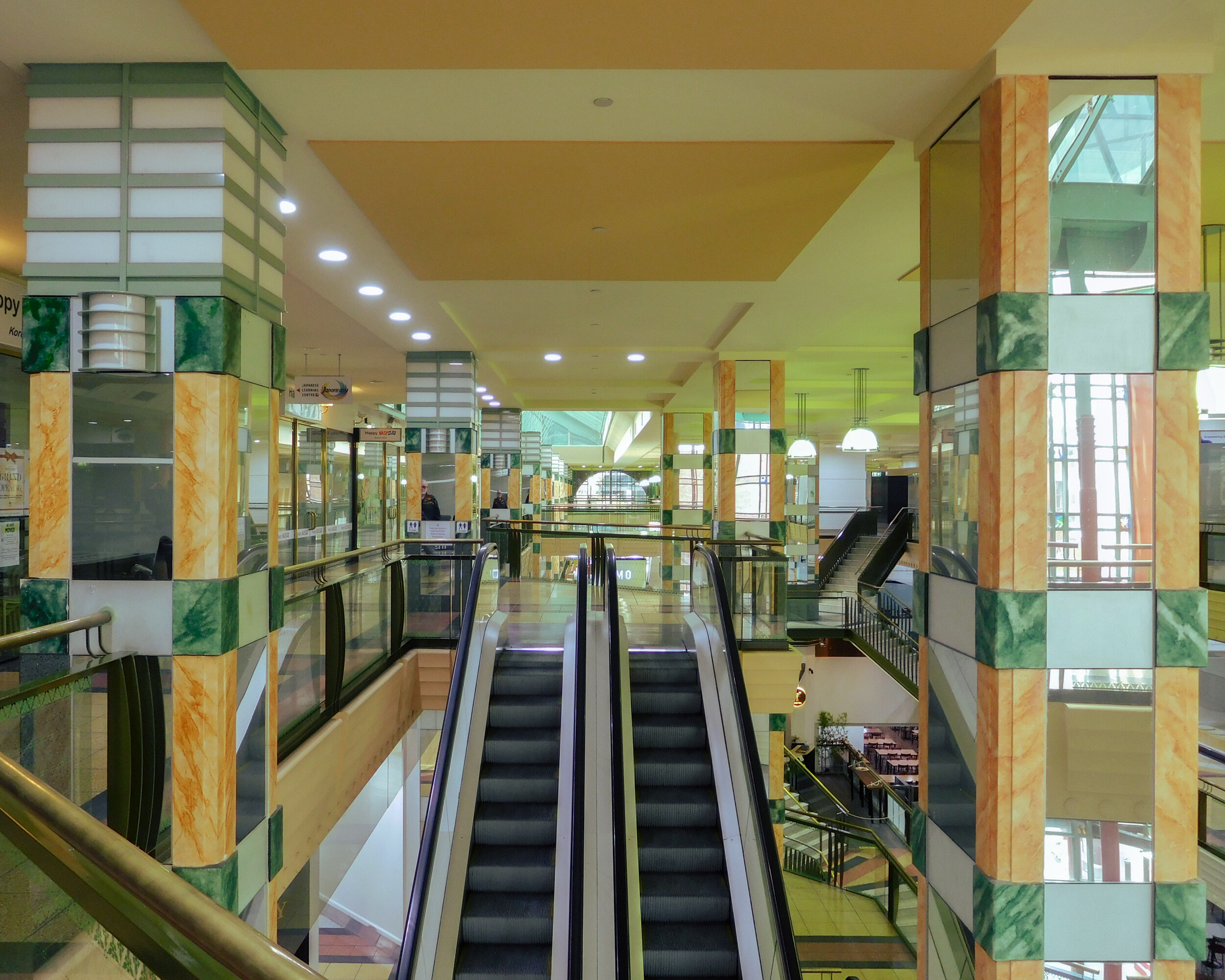 <p>Third floor of the Paramount Centre, on the left side are the lantern columns. Photograph by author.</p>