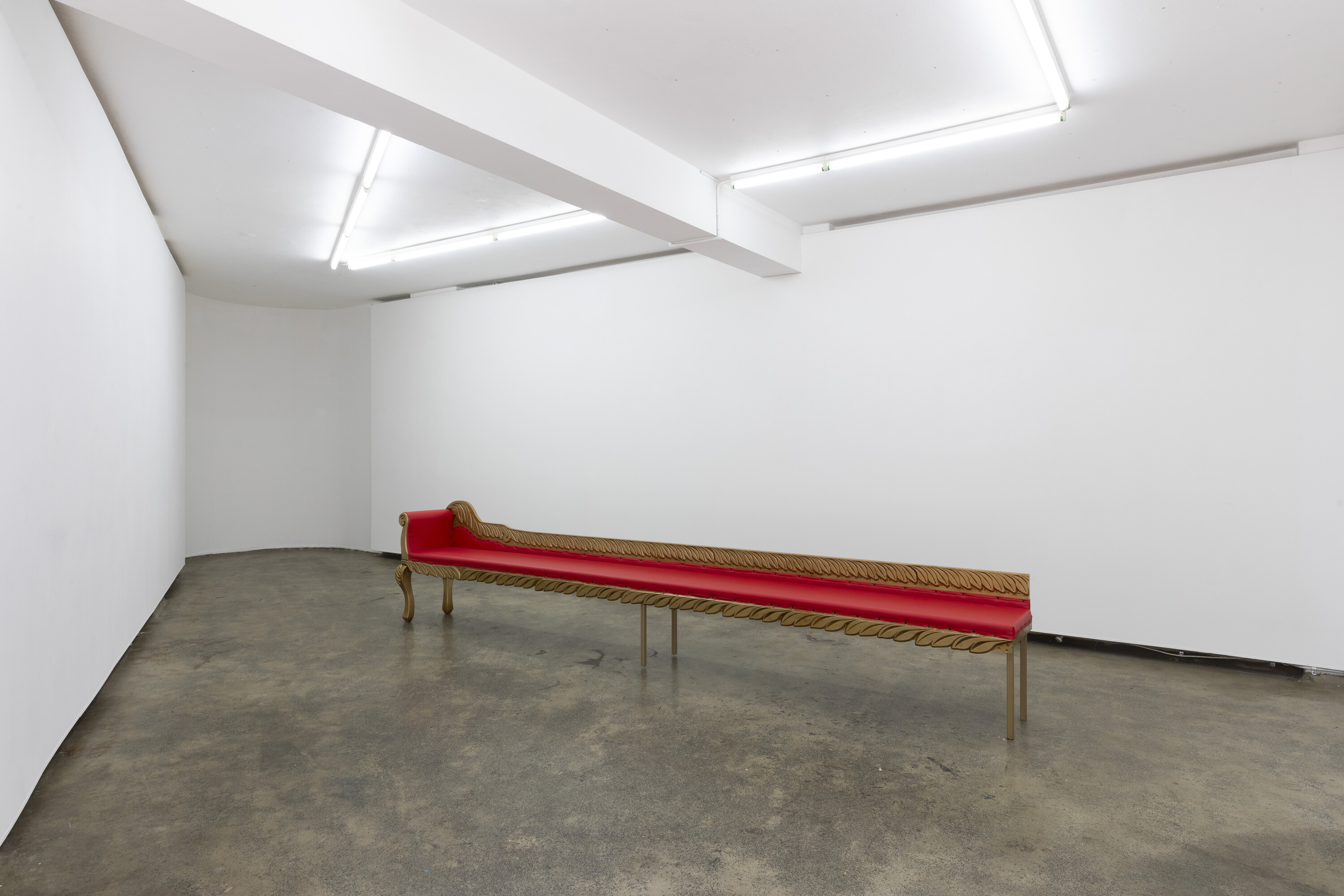 <p>Lisa Myeong-Joo, <em>The Red Chair in Your Picture Does Not Exist</em>, 2024, steel, plywood, PVC, vinyl, PU foam, acrylic, 400 x 84.5 x 42 cm. Photo: Jessica Maurer</p>