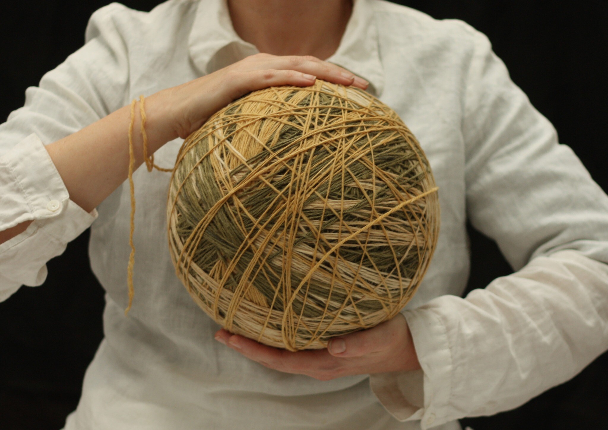 <p>Kristi Biezaite, <em>Yearlong Thread</em>, © 2024, hand spun, three-ply yarn from a single whole fleece, naturally dyed with red flowering gum, dimensions variable, East Gippsland Art Gallery. </p>