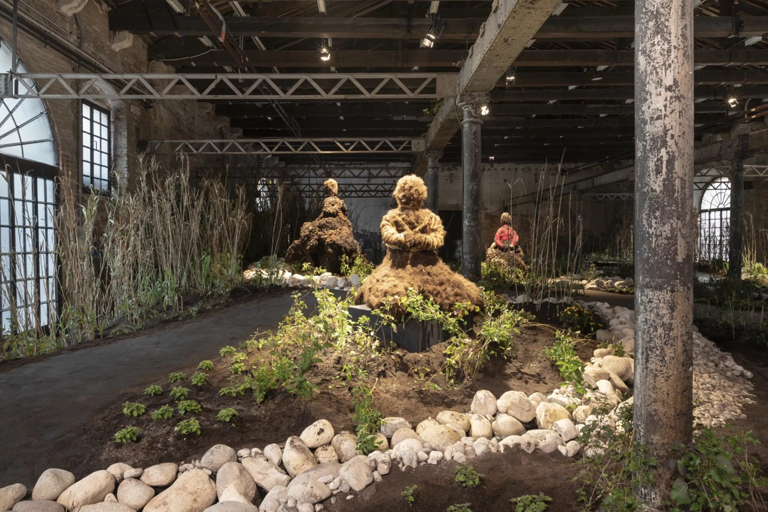 Precious Okoyomon, installation view of <em>To See The Earth Before the End of the World</em>, 2022, at the 59th International Art Exhibition – La Biennale di Venezia, “The Milk of Dreams,” in July 2022. Photo by Clelia Cadamuro. Courtesy of the artist and Quinn Harrelson Gallery.