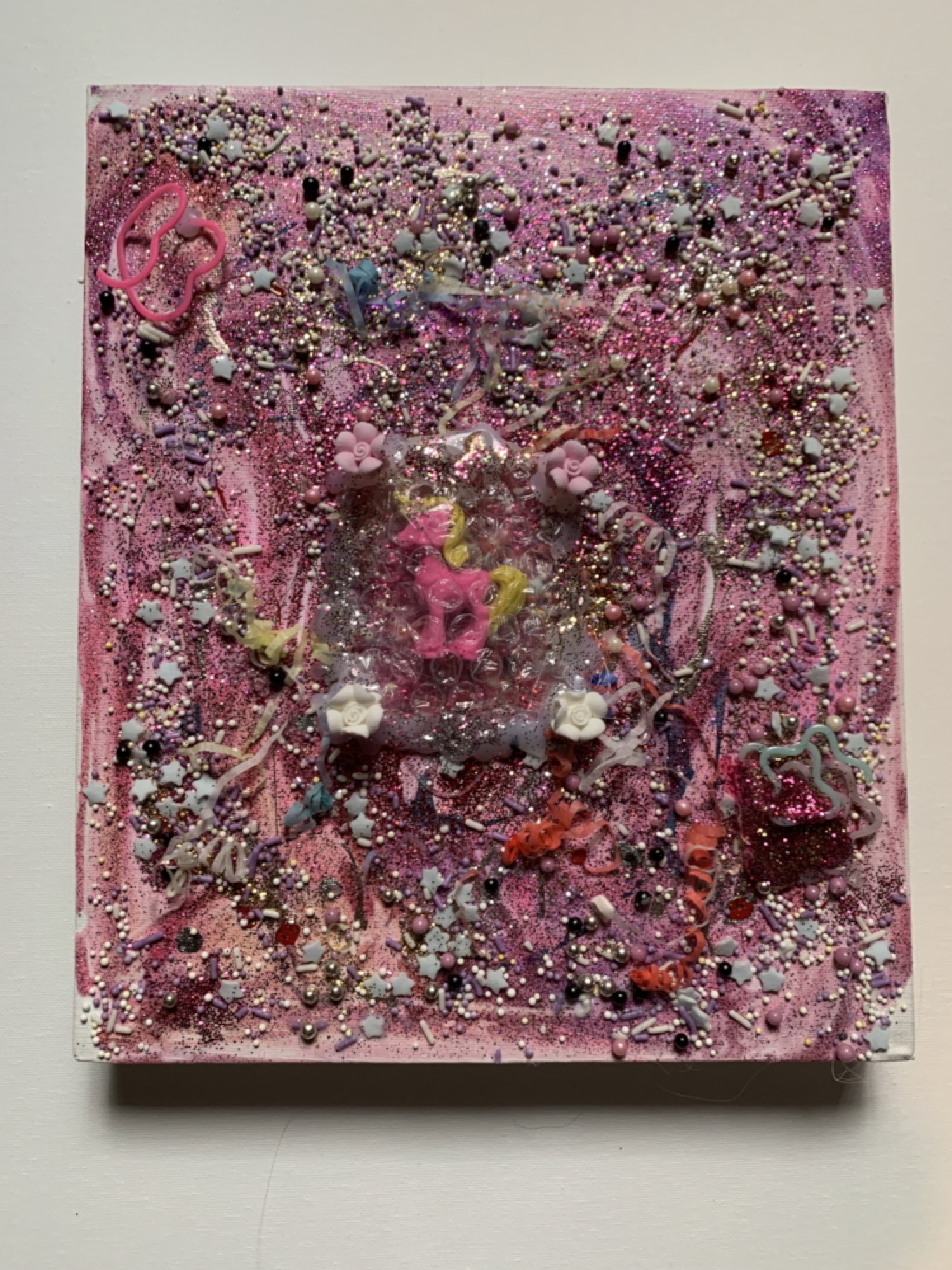 Phoebe Haffenden, <em>EXTINCTION</em>, 2020, lost and found objects, candy glitter and children’s washable glitter paint. Courtesy of the artist.