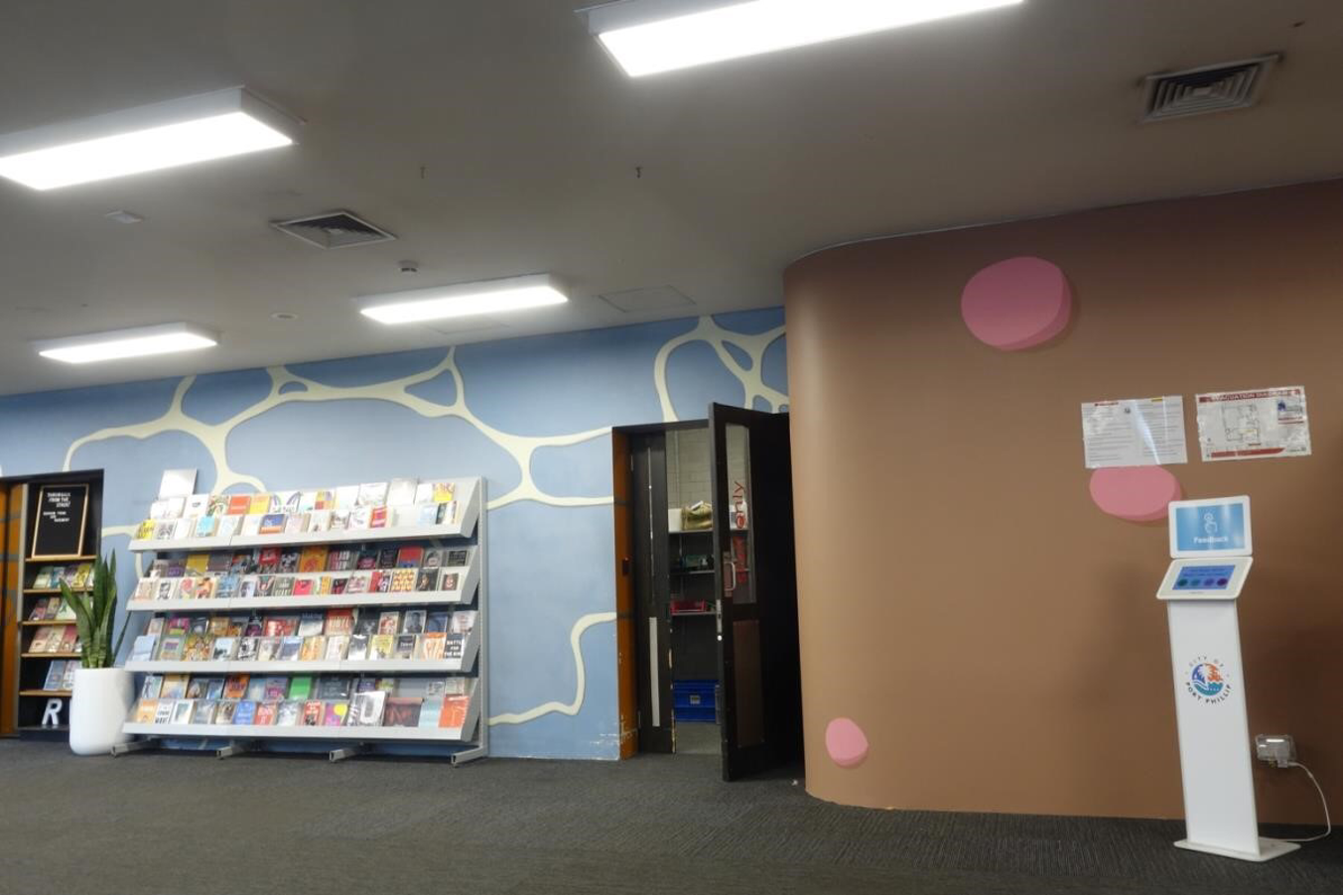 <p> Installation view of Tony Clark, <em>Jasperware Landscape</em>, 1994, acrylic and varnish on wall, 210 x 970 x 40 cm, St. Kilda Public Library, Melbourne. Photo: Ebony Maurice-Wilmott.</p>
